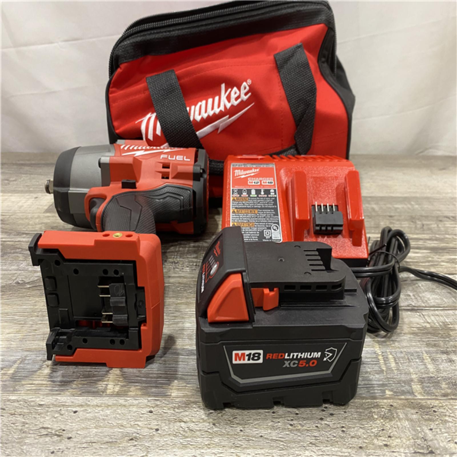 AS-IS Milwaukee FUEL 1/2 High Torque Impact Wrench with Friction Ring Kit