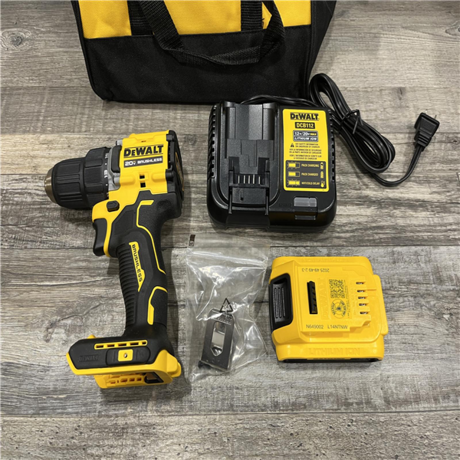 AS-IS DEWALT Atomic 20V Max Lithium-Ion Brushless Cordless Compact 1/4 in. Impact Driver Kit