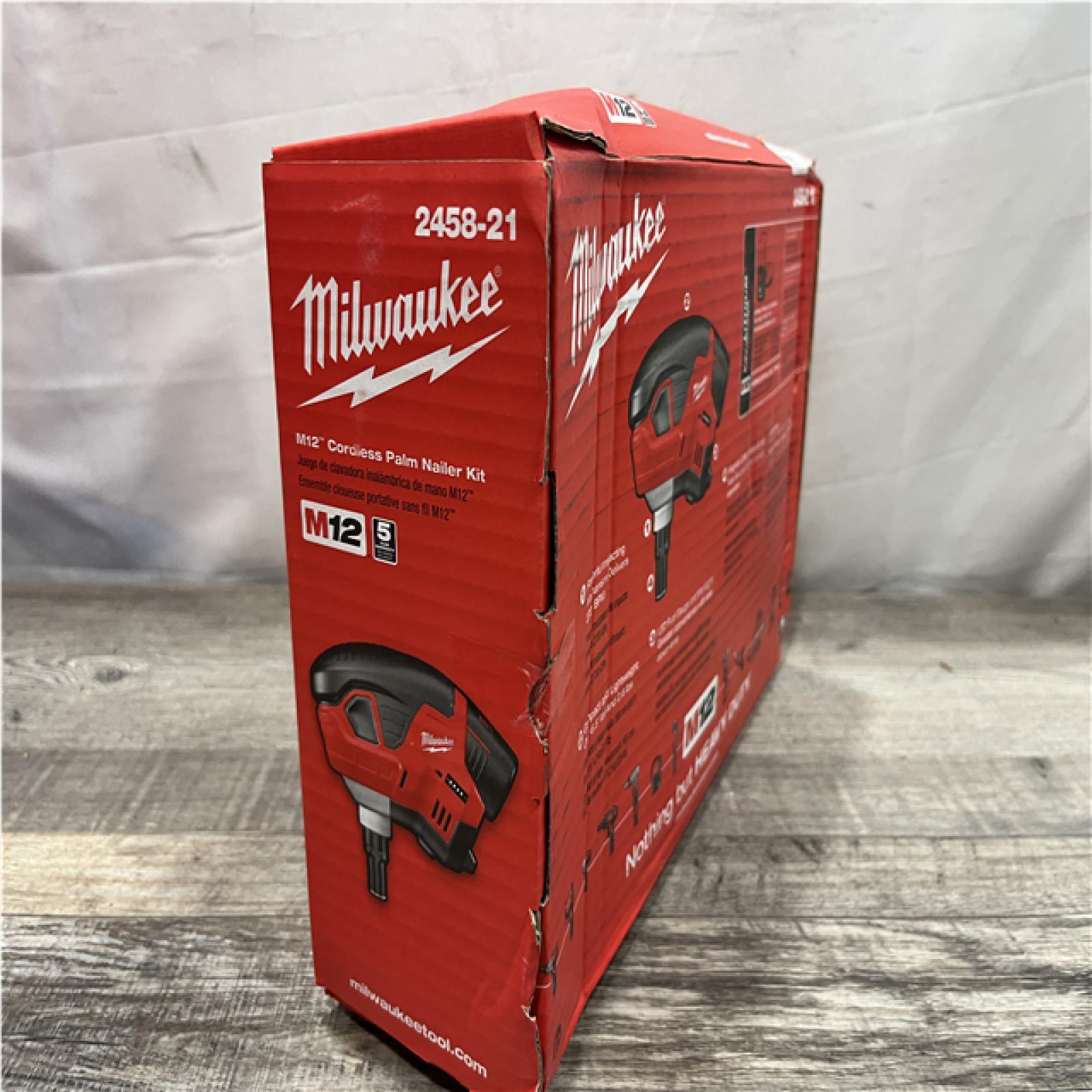 NEW - Milwaukee 12-Volt Lithium-Ion Cordless Palm Nailer Kit