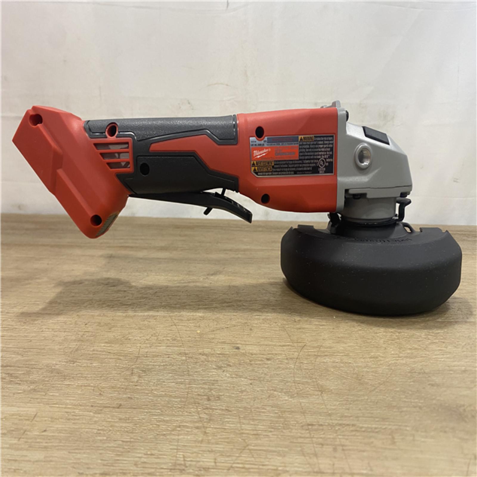 AS-IS Milwaukee 18V Lithium-Ion Brushless Cordless 4-1/2 in./5 in. Grinder w/Paddle Switch (Tool-Only)