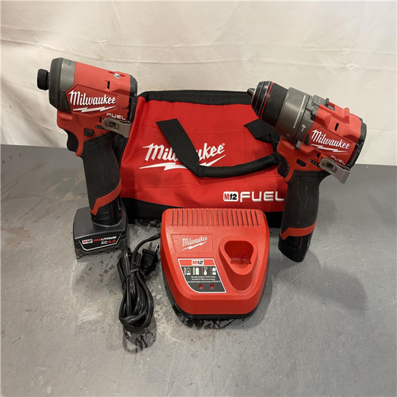 AS-IS - Milwaukee M12 FUEL 12-Volt Lithium-Ion Brushless Cordless Hammer Drill and Impact Driver Combo Kit (2 Tool)