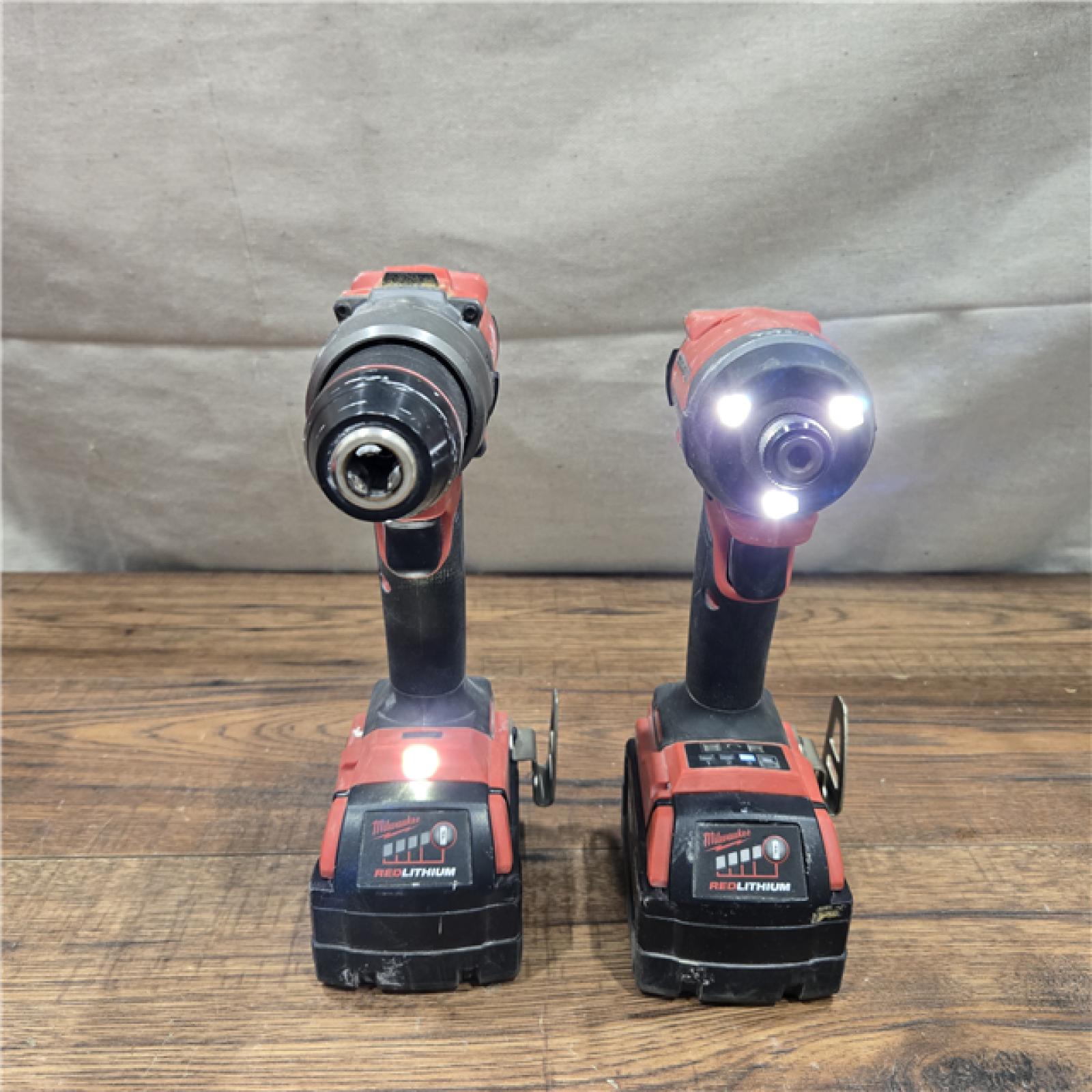 AS-IS MILWAUKEE M18 FUEL 18V Lithium-Ion Brushless Cordless Hammer Drill and Impact Driver Combo Kit (2-Tool) with 2 Batteries