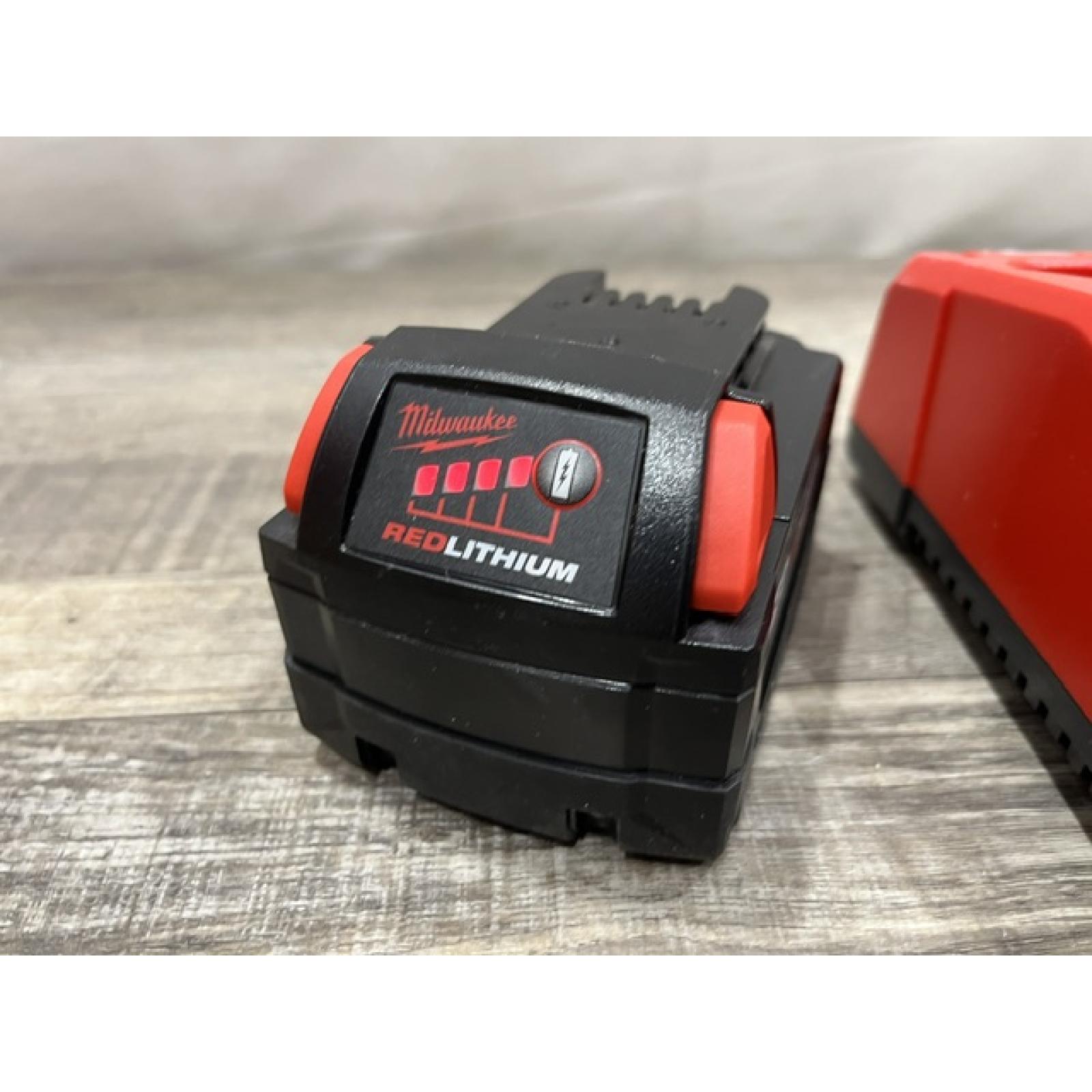 AS-IS Milwaukee 18-Volt Lithium-Ion XC Starter Kit with One 5.0Ah Battery and Charger