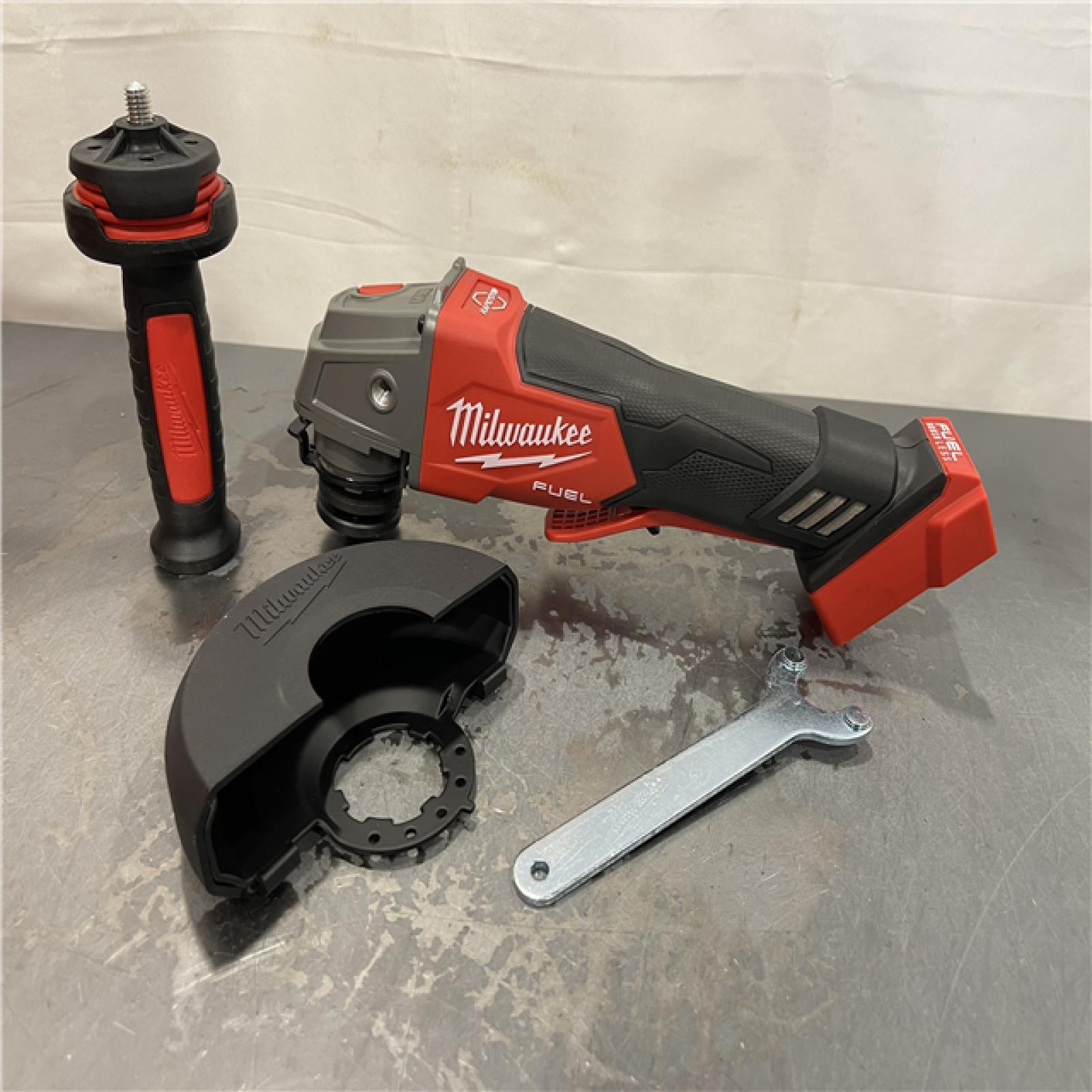 AS-IS - Milwaukee M18 FUEL 18V Lithium-Ion Brushless Cordless 4-1/2 in./5 in. Grinder w/Paddle Switch