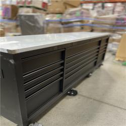 DALLAS LOCATION- Husky 96 in. W x 24 in. D 16-Drawer Heavy-Duty Mobile Workbench with Stainless Steel Top in Matte Black