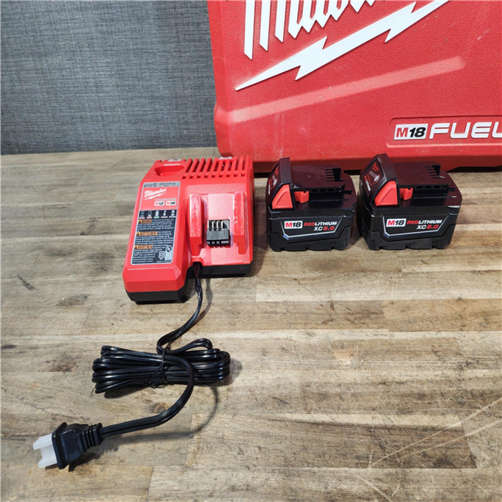 HOUSTON LOCATION - AS-IS Milwaukee M18 FUEL 18V Lithium-Ion Brushless Cordless Hammer Drill and Impact Driver Combo Kit