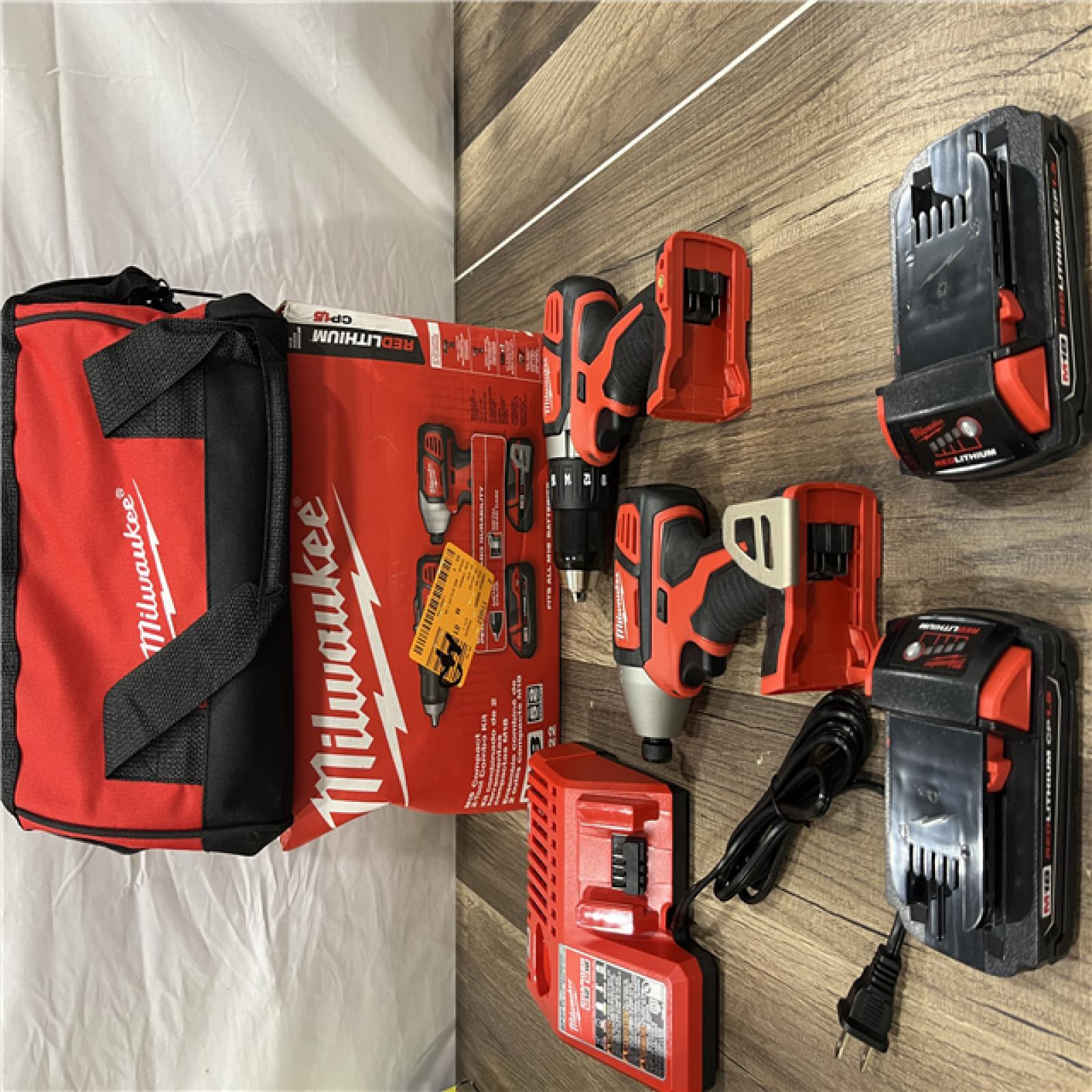 GOOD   Milwaukee 18V Cordless Brushed 2 Tool Drill/Driver and Impact Driver Kit