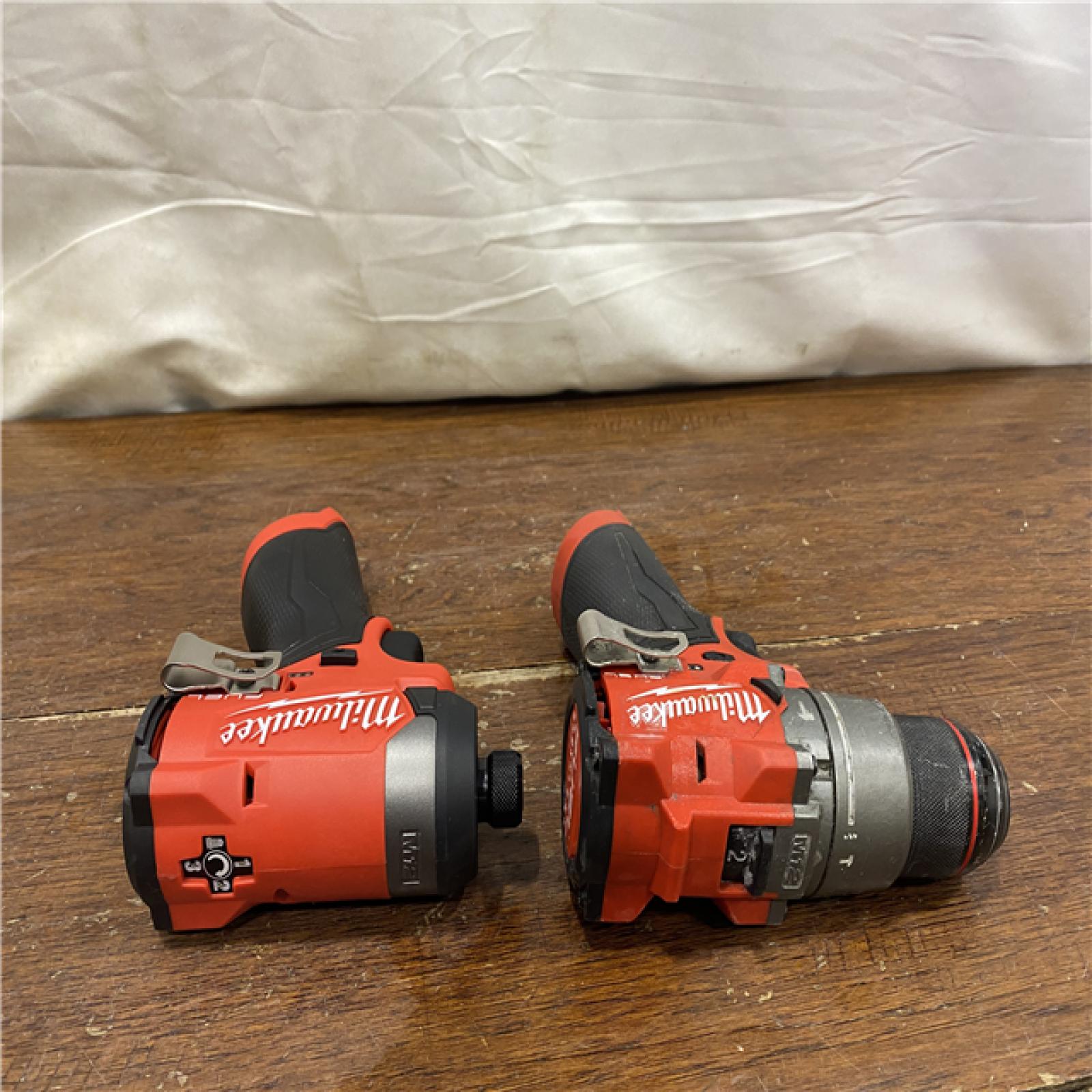 AS-IS MILWAUKEE M18 FUEL 18V Lithium-Ion Brushless Cordless Hammer Drill and Impact Driver Combo Kit (2-Tool) with 2 Batteries