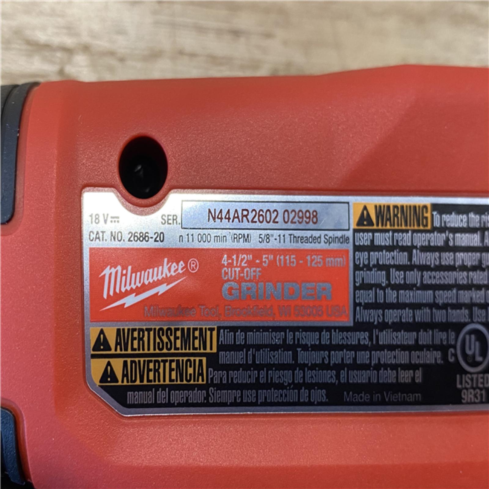 AS-IS Milwaukee 18V Lithium-Ion Brushless Cordless 4-1/2 in./5 in. Grinder w/Paddle Switch (Tool-Only)