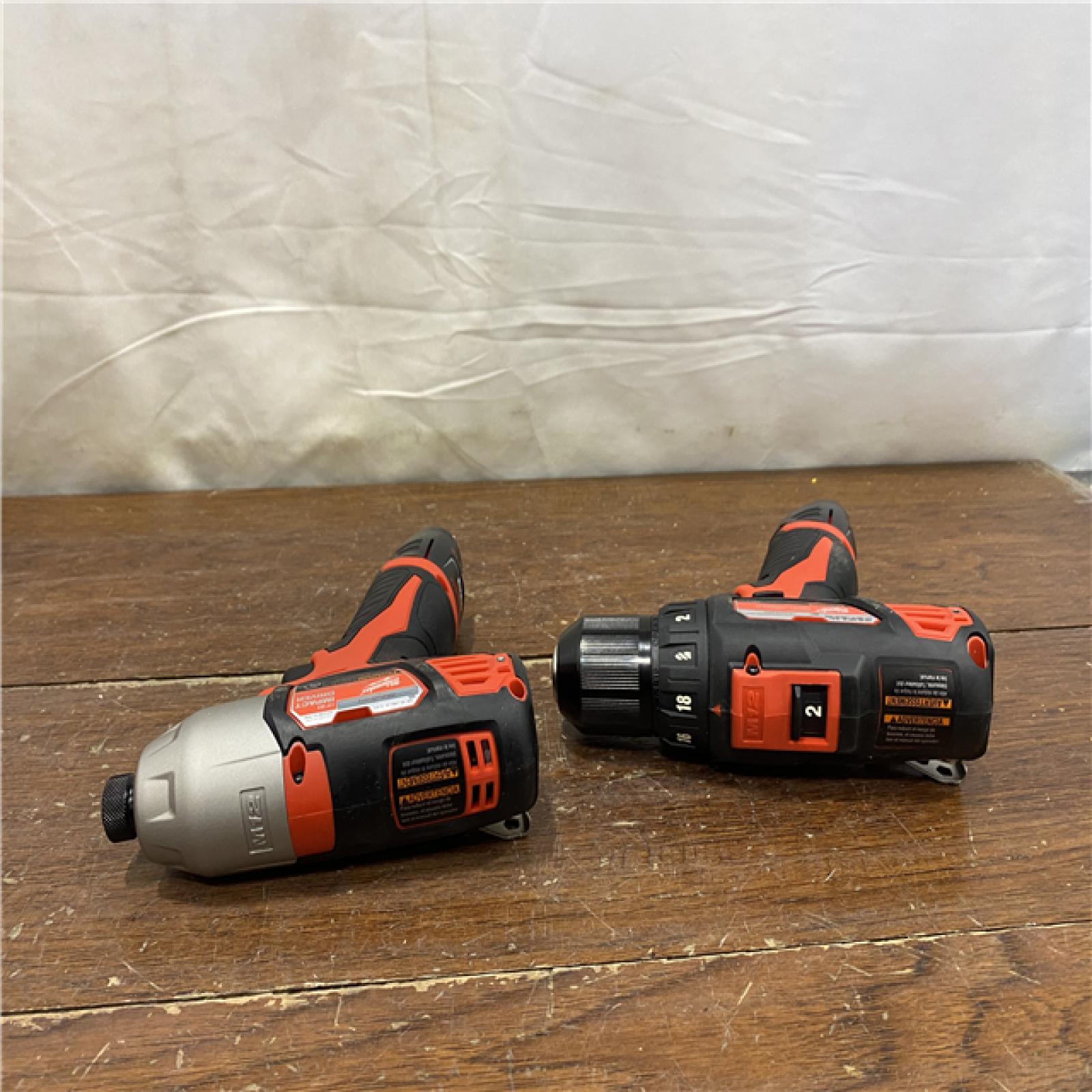 AS-IS Milwaukee M12 12V Lithium-Ion Cordless Drill Driver/Impact Driver Combo Kit with Two 1.5Ah Batteries, Charger and Bag (2-Tool)