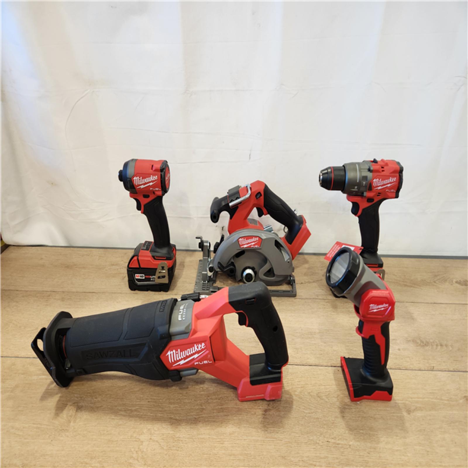 AS-IS- M18 FUEL 18V Lithium-Ion Brushless Cordless Combo Kit (5-Tool) with Two 5.0 Ah Batteries  1 Charger 1 Tool Bag
