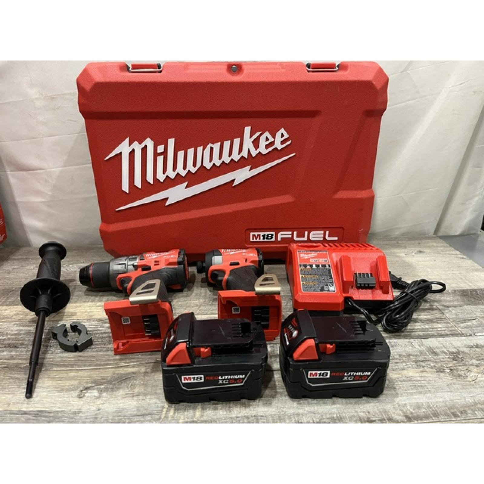 AS-IS Milwaukee FUEL 18V Lithium-Ion Brushless Cordless Hammer Drill and Impact Driver Combo Kit