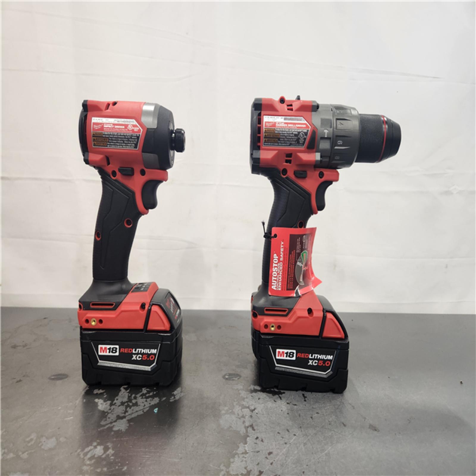 AS-IS- Milwaukee FUEL 18V Lithium-Ion Brushless Cordless Hammer Drill and Impact Driver Combo Kit (2-Tool) with 2 Batteries