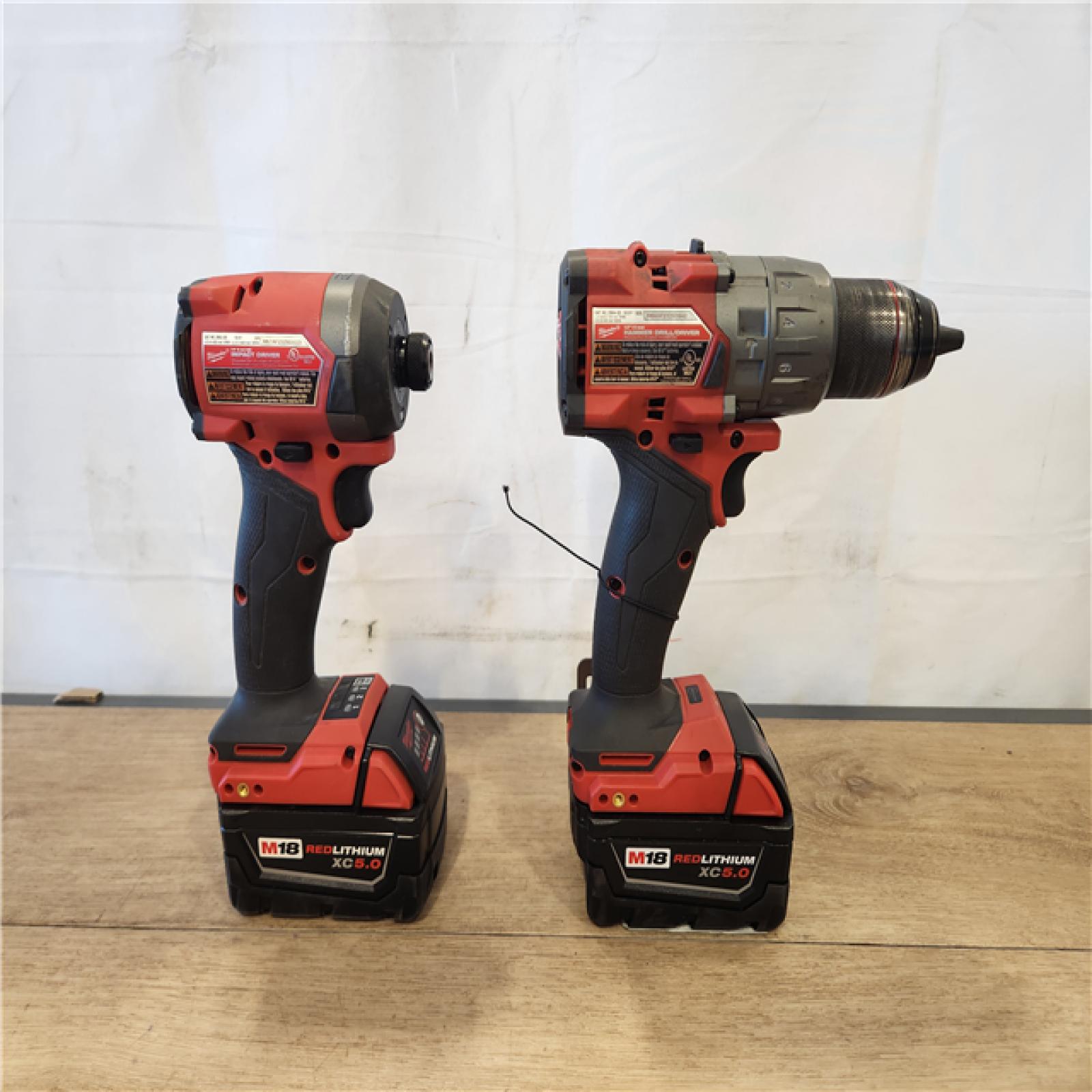 AS-IS- Milwaukee FUEL 18V Lithium-Ion Brushless Cordless Hammer Drill and Impact Driver Combo Kit