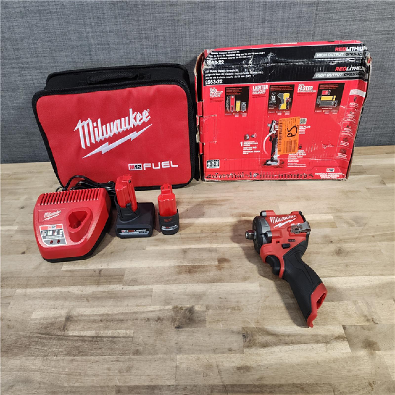 HOUSTON LOCATION - AS-IS Milwaukee M12 FUEL Cordless Compact Impact Wrench Kit, Brushless, 1/2 Torque, 12V