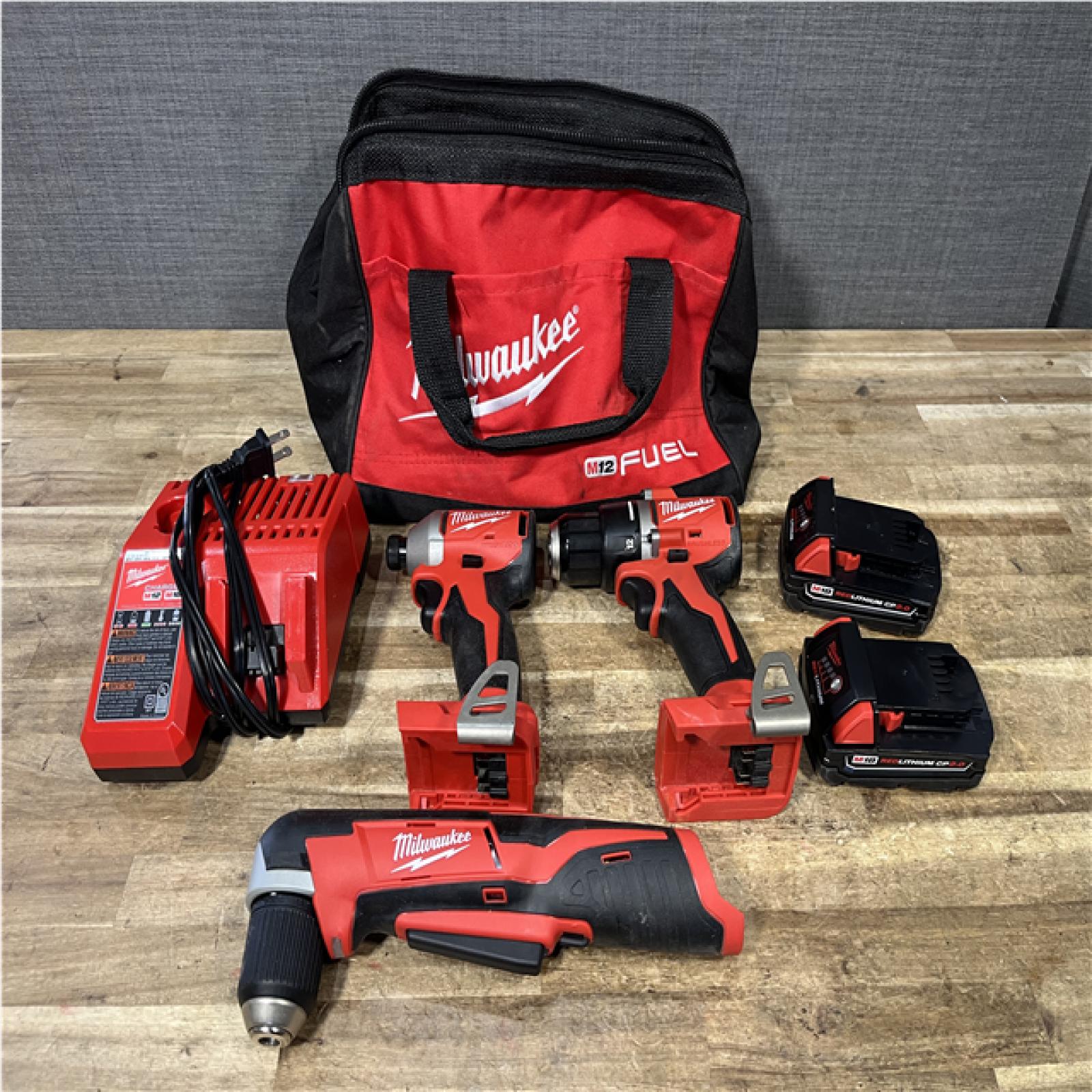 Houston Location AS-IS Milwaukee Drill Driver and Impact Driver and Right Angle Drill and Batteries QTY/2 and Charger