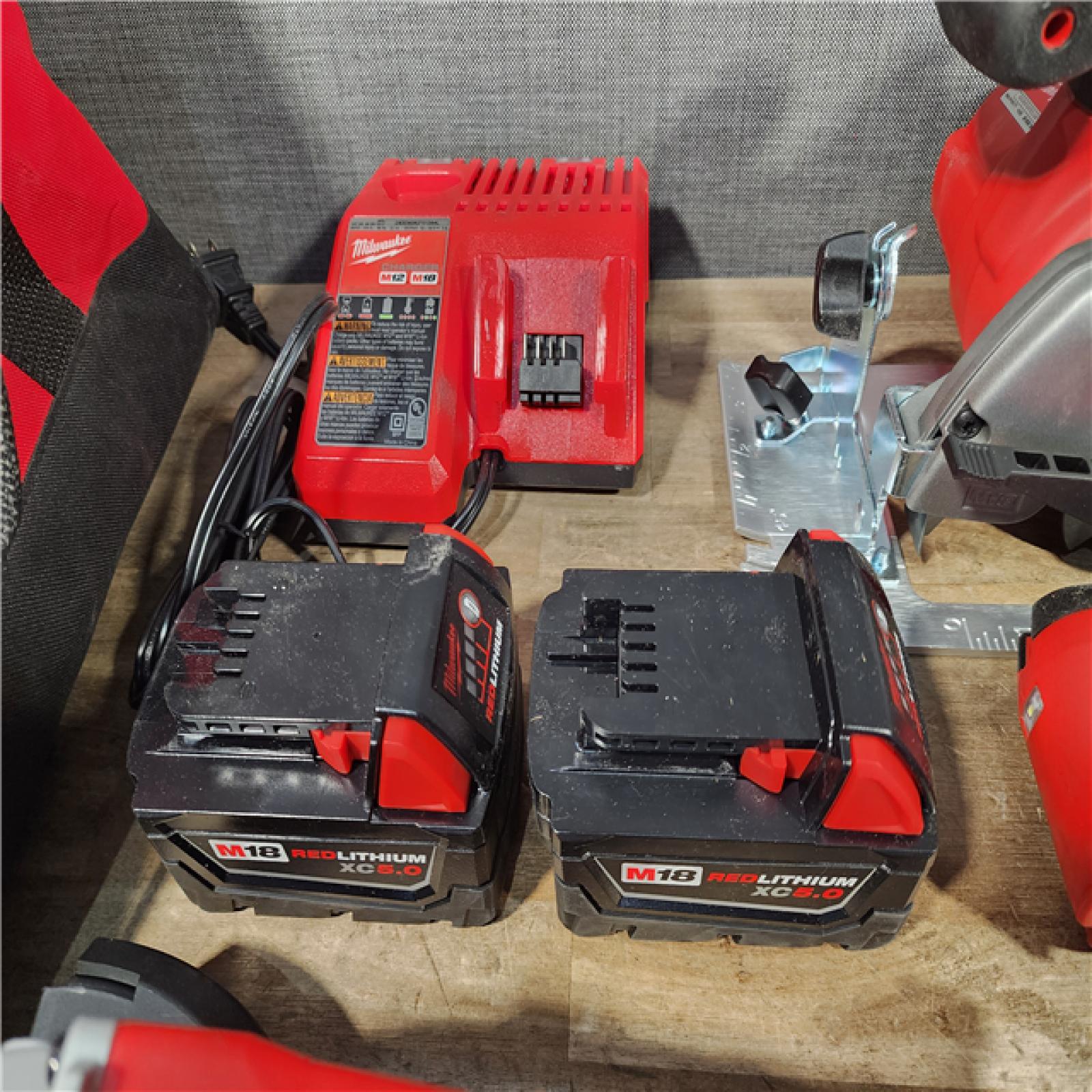 HOUSTON LOCATION - AS-IS MILWAUKEE 9 TOOL COMBO KIT W/ (2) BATTERY & CHARGER