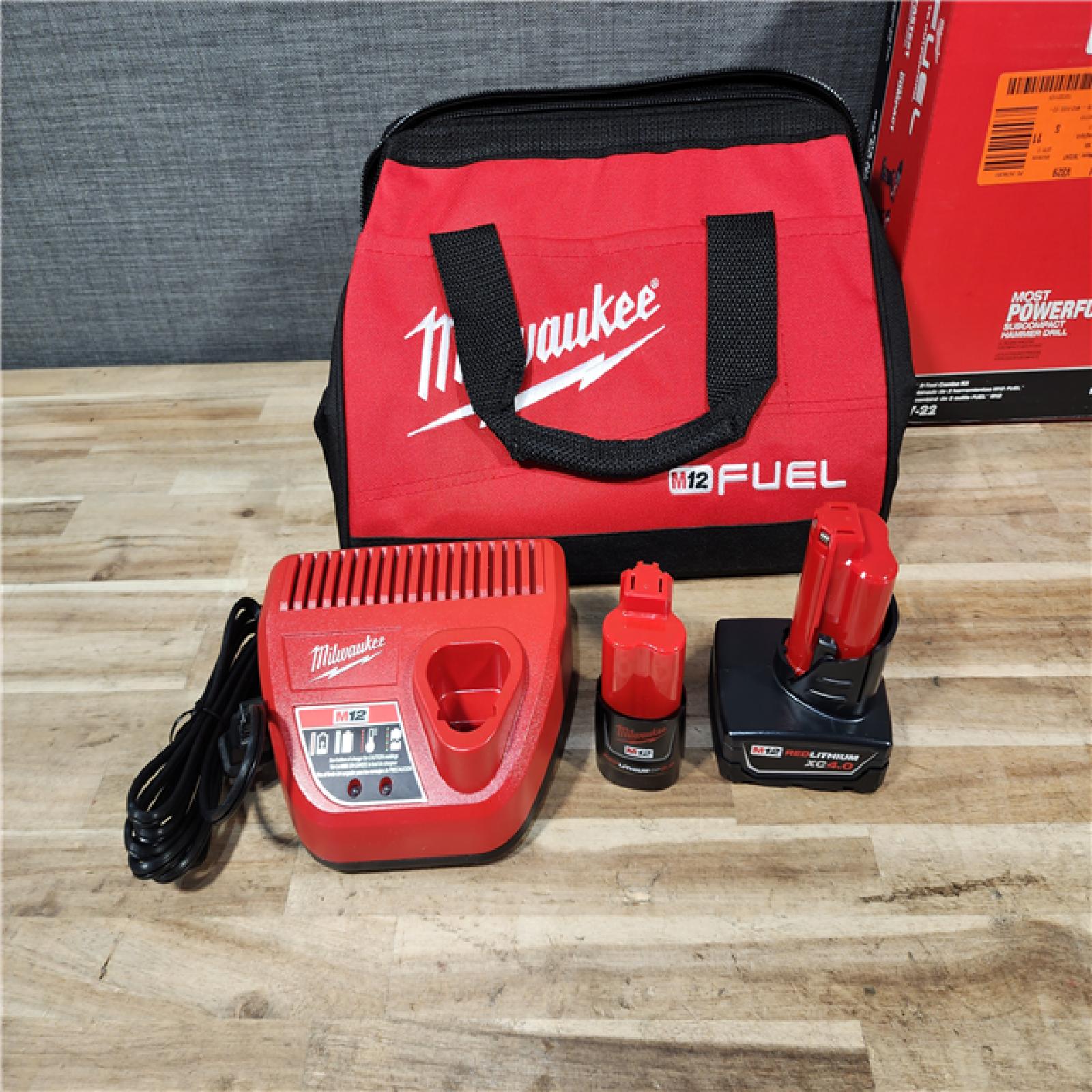 HOUSTON LOCATION - AS-IS (APPEARS LIKE NEW) Milwaukee  FUEL 12-Volt Lithium-Ion Brushless Cordless Hammer Drill and Impact Driver Combo Kit