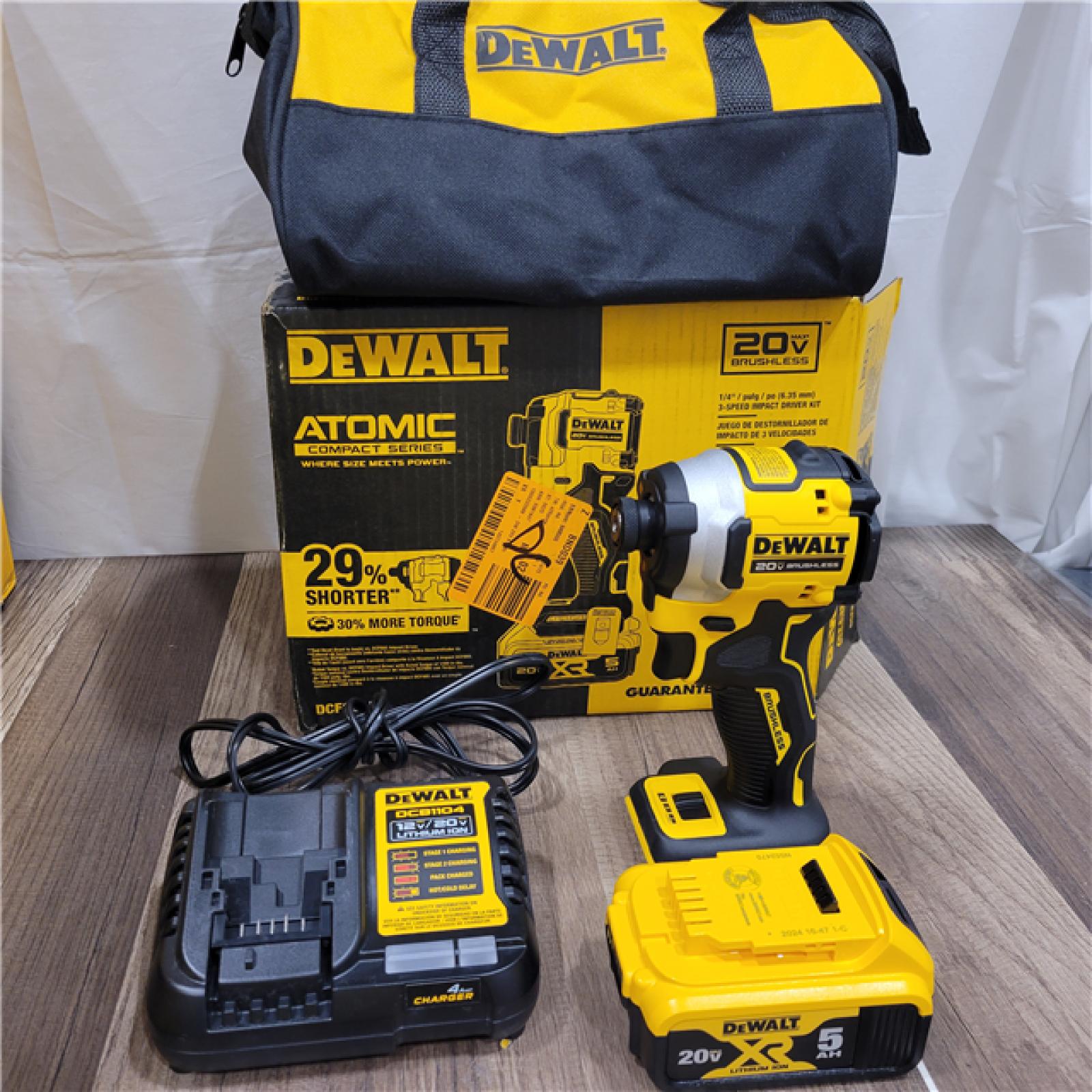 AS-IS DEWALT ATOMIC 20V MAX Lithium-Ion Cordless 1/4 in. Brushless Impact Driver Kit, 5 Ah Battery, Charger, and Bag
