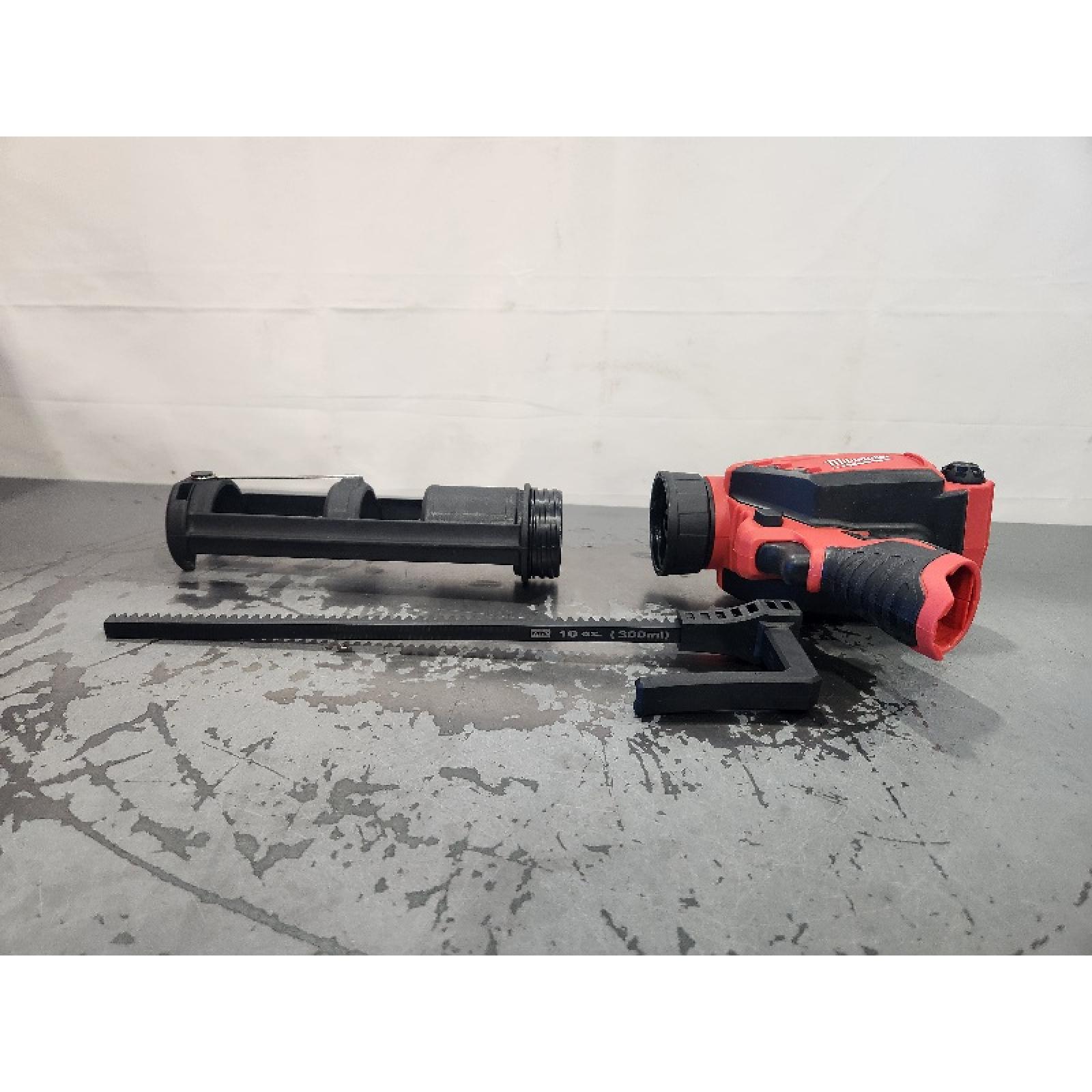AS-IS- Milwaukee M12 12V Cordless 10oz Caulk/Adhesive Gun (Tool Only)