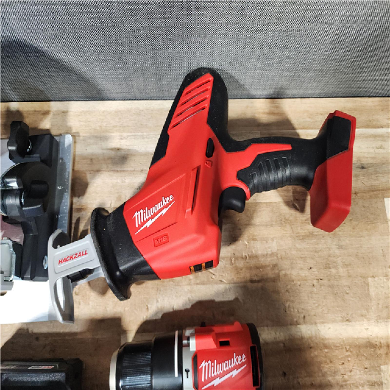 HOUSTON LOCATION - AS - IS Milwaukee 3 Tool Combo Kit W/ (2) Battery & Charger