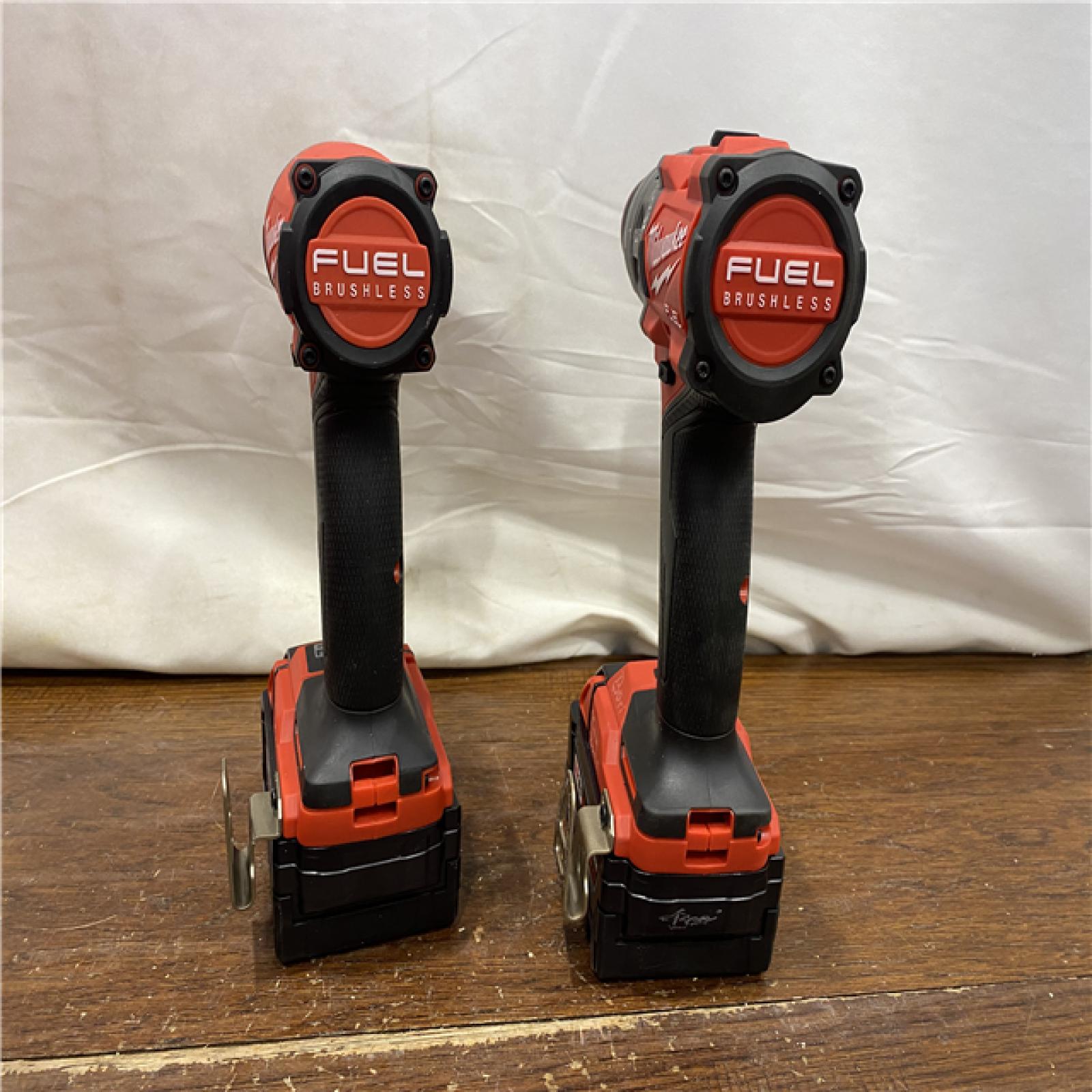 AS-IS MILWAUKEE M18 FUEL 18V Lithium-Ion Brushless Cordless Hammer Drill and Impact Driver Combo Kit (2-Tool) with 2 Batteries