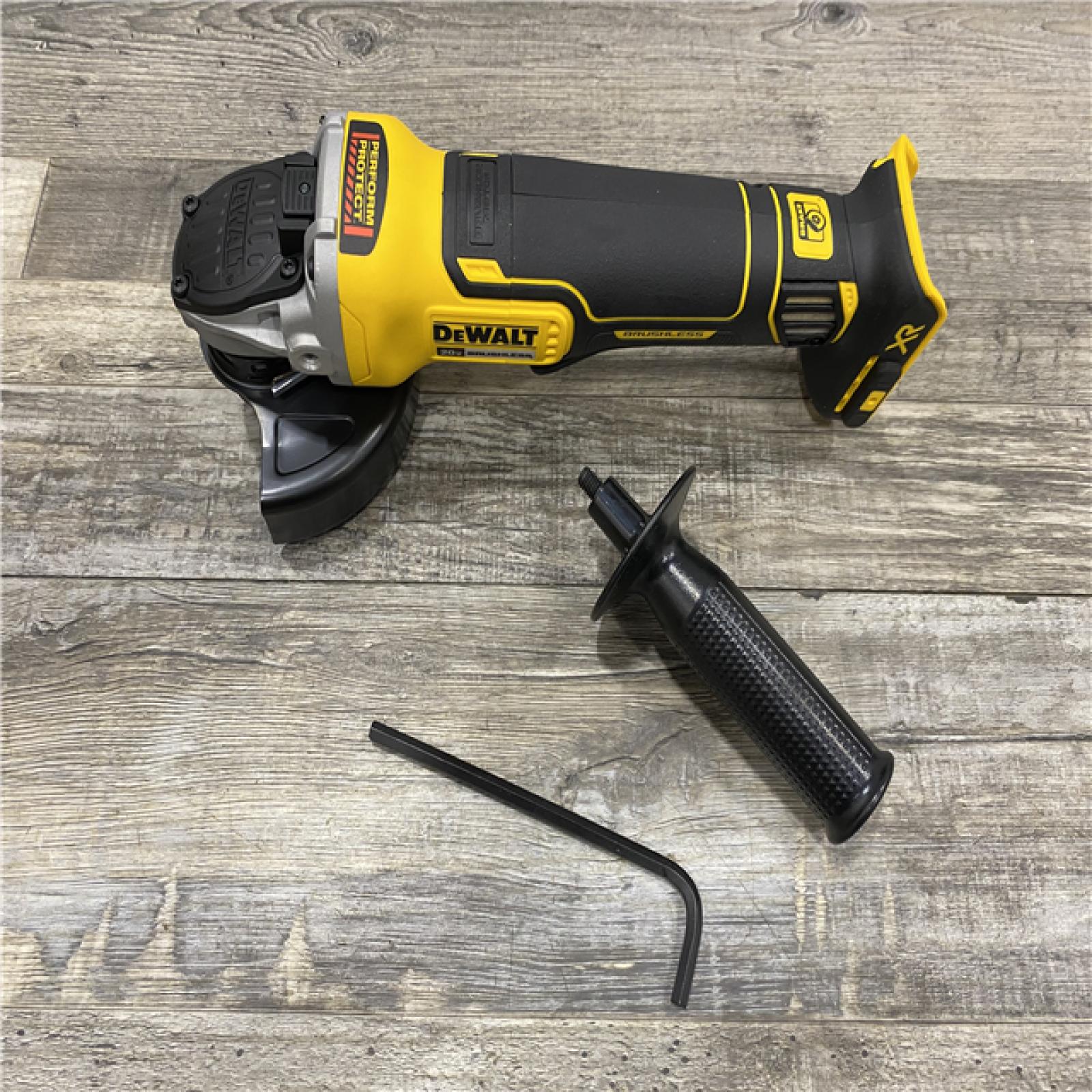 AS-IS DEWALT 20-Volt MAX XR Lithium-Ion Cordless Brushless 4-1/2 in. Paddle Switch Small Angle Grinder w/ Kickback Brake (Tool-Only)