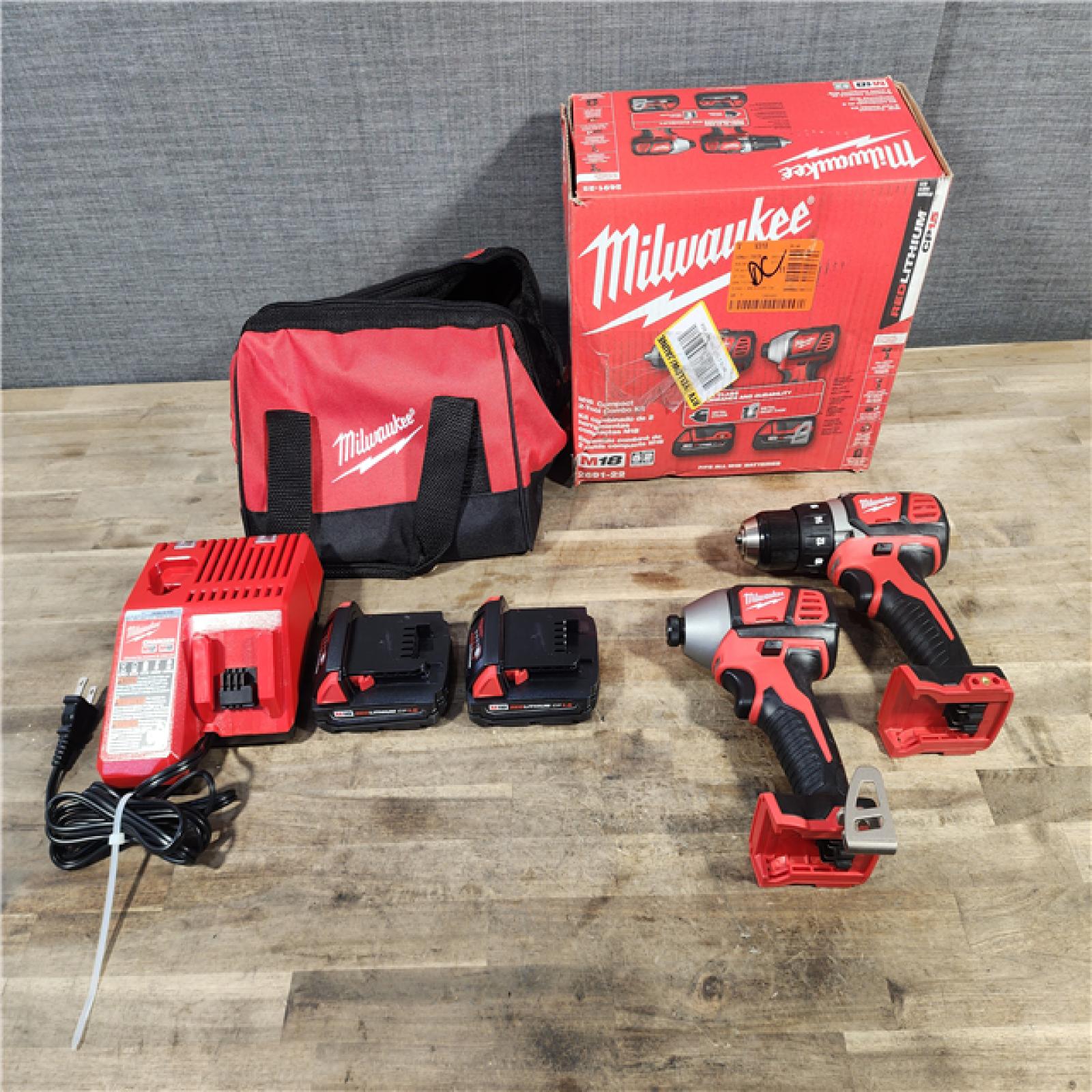 HOUSTON LOCATION - AS-IS Milwaukee M18 Brushed Cordless (2-Tool) Drill/Driver and Impact Driver Kit