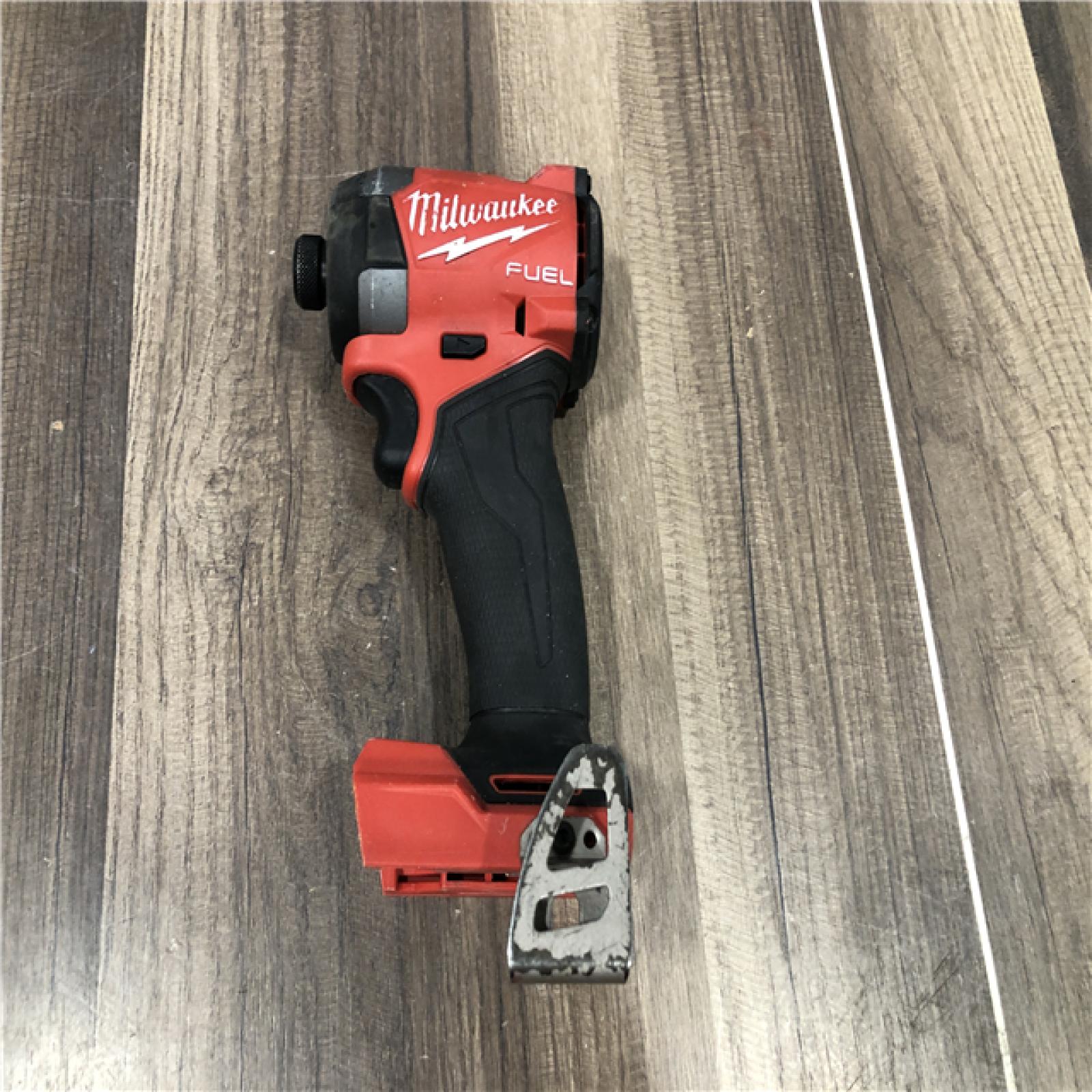 AS-IS Milwaukee  FUEL 18V Lithium-Ion Brushless Cordless 1/4 in. Hex Impact Driver (Tool-Only)