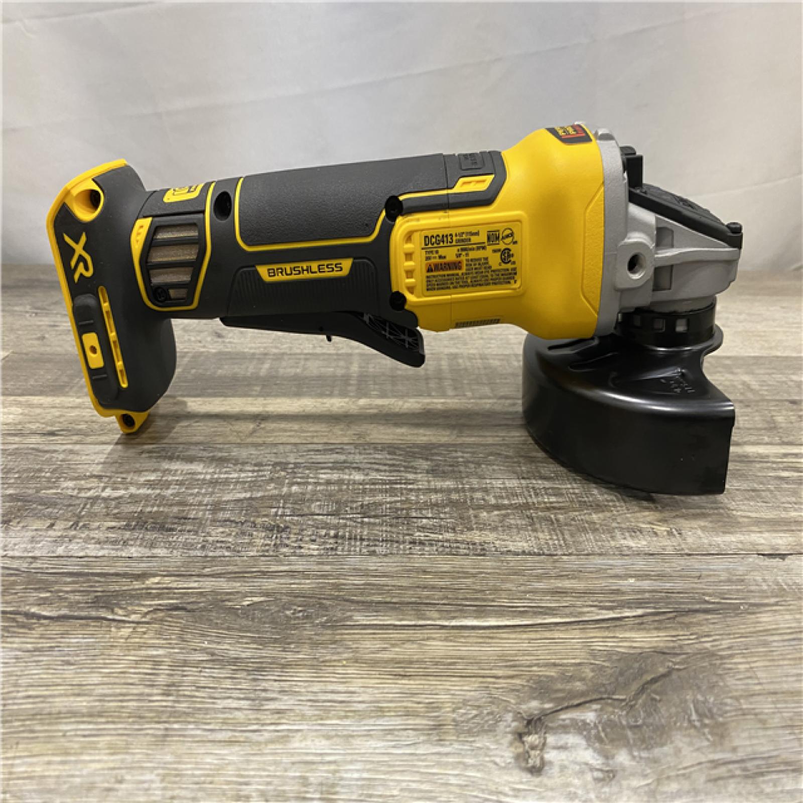 AS-IS DEWALT 20-Volt MAX XR Lithium-Ion Cordless Brushless 4-1/2 in. Paddle Switch Small Angle Grinder w/ Kickback Brake (Tool-Only)