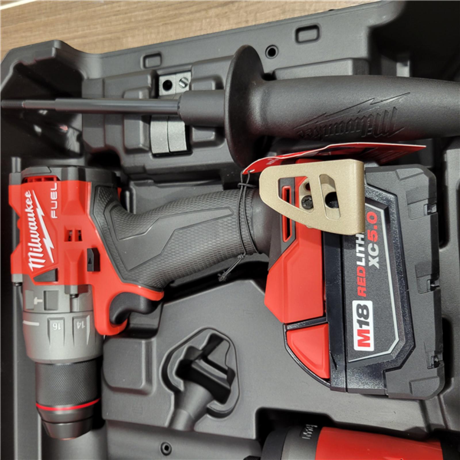AS-IS MILWAUKEE M18 FUEL 18V Lithium-Ion Brushless Cordless Hammer Drill and Impact Driver Combo Kit (2-Tool) with 2 Batteries