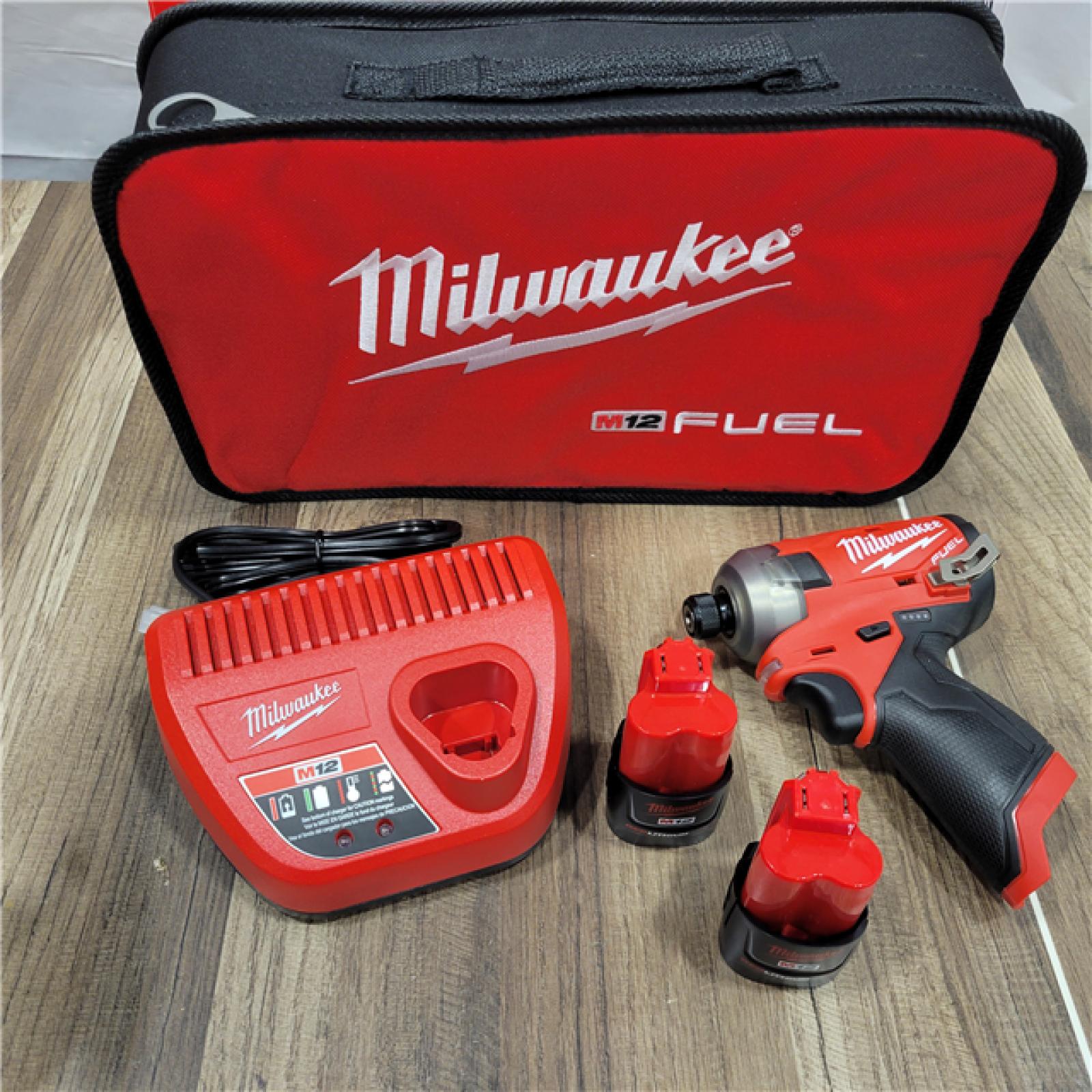 AS-IS Milwaukee M12 FUEL SURGE 12V Lithium-Ion Brushless Cordless 1/4 in. Hex Impact Driver Compact Kit W/Two 2.0Ah Batteries, Bag