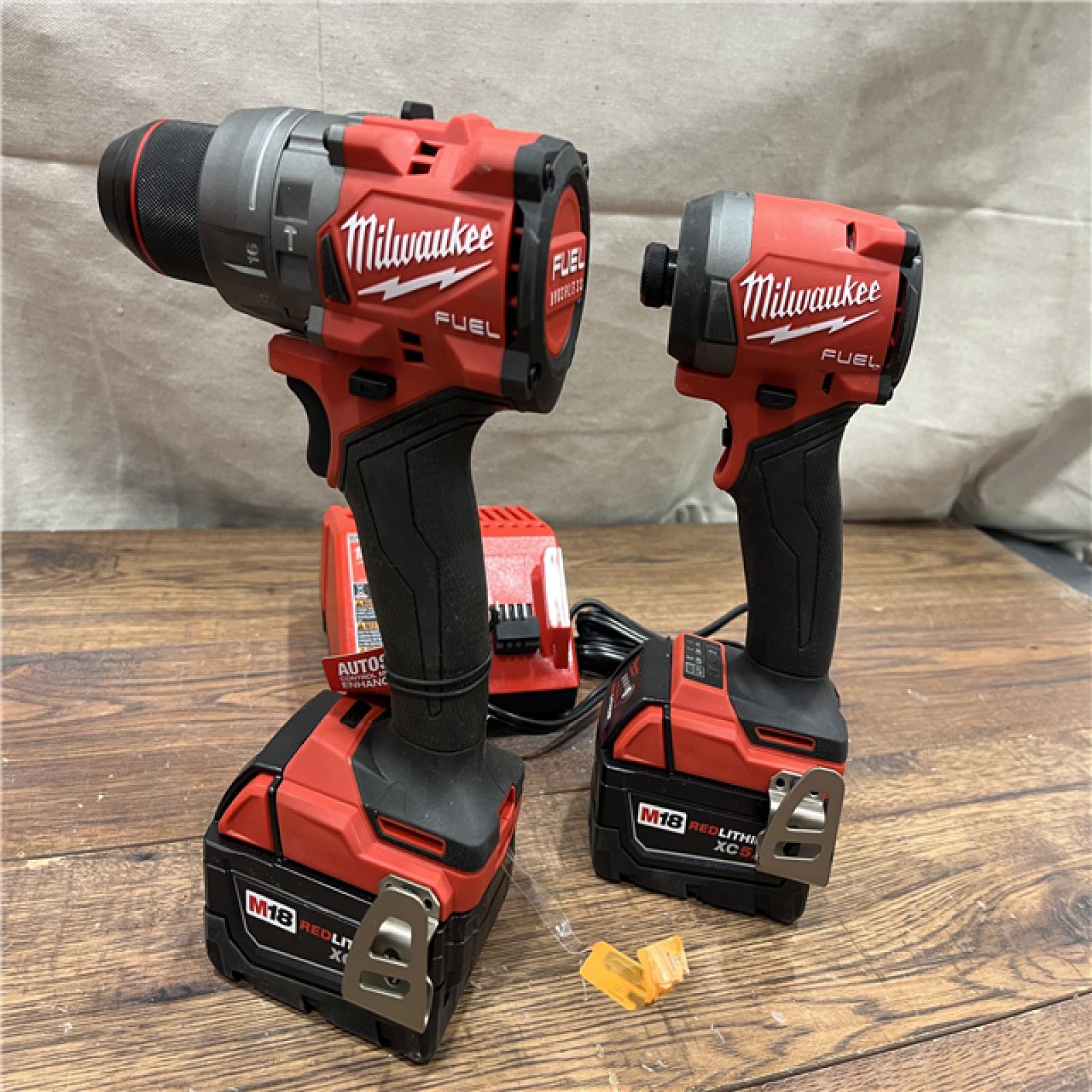 AS-IS Milwaukee M18 FUEL 18V Lithium-Ion Brushless Cordless Hammer Drill and Impact Driver Combo Kit (2-Tool) with 2 Batteries