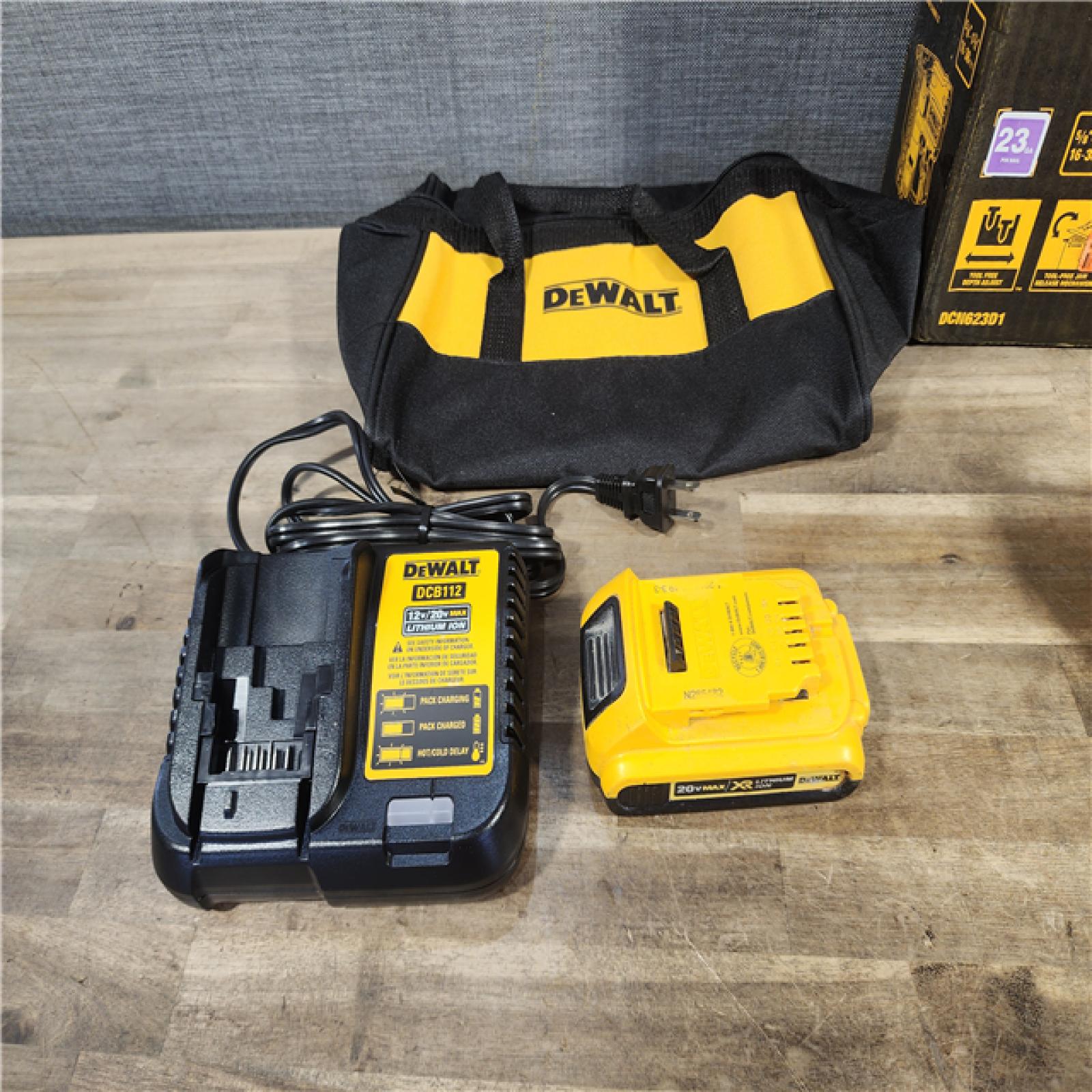 HOUSTON LOCATION - AS-IS DEWALT ATOMIC 20V MAX Lithium Ion Cordless 23 Gauge Pin Nailer Kit with 2.0Ah Battery and Charger