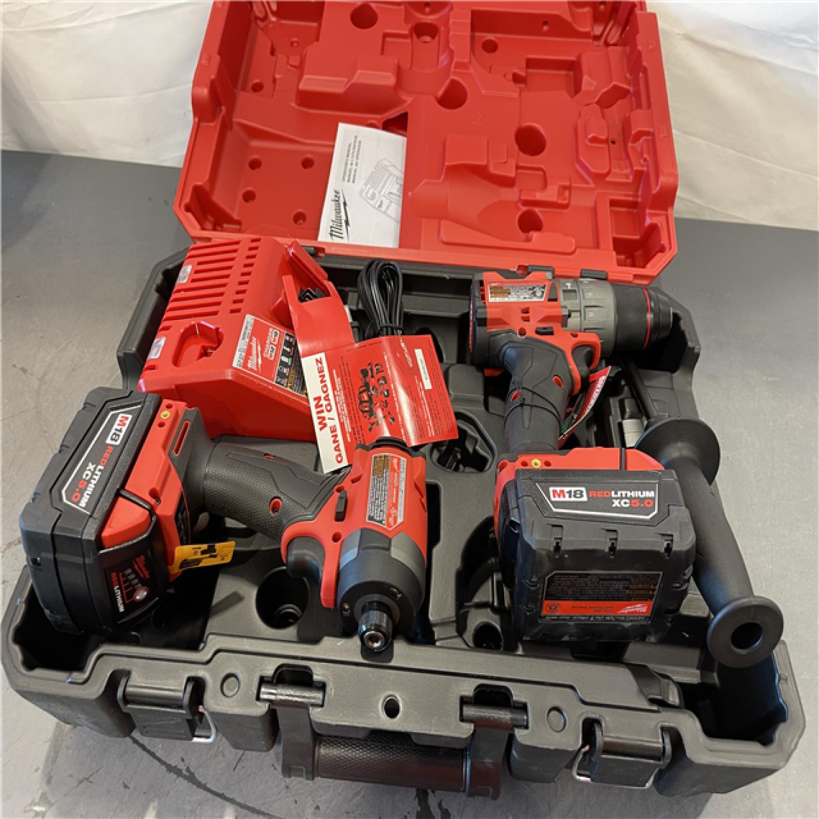 AS-IS - Milwaukee M18 FUEL 18V Lithium-Ion Brushless Cordless Hammer Drill and Impact Driver Combo Kit