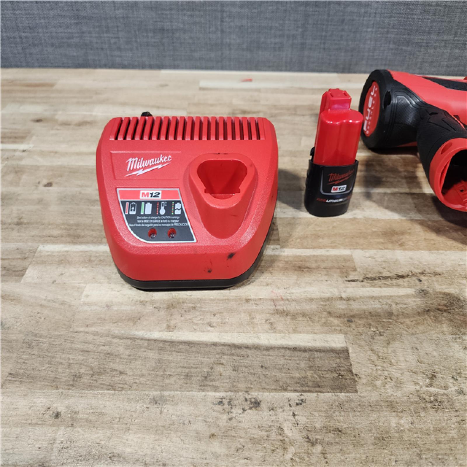 HOUSTON LOCATION - AS - IS Milwaukee FUEL 12-Volt Lithium-Ion Brushless Cordless 18-Gauge 1-1/2 in. Compact Brad Nailer W/ battery & charger