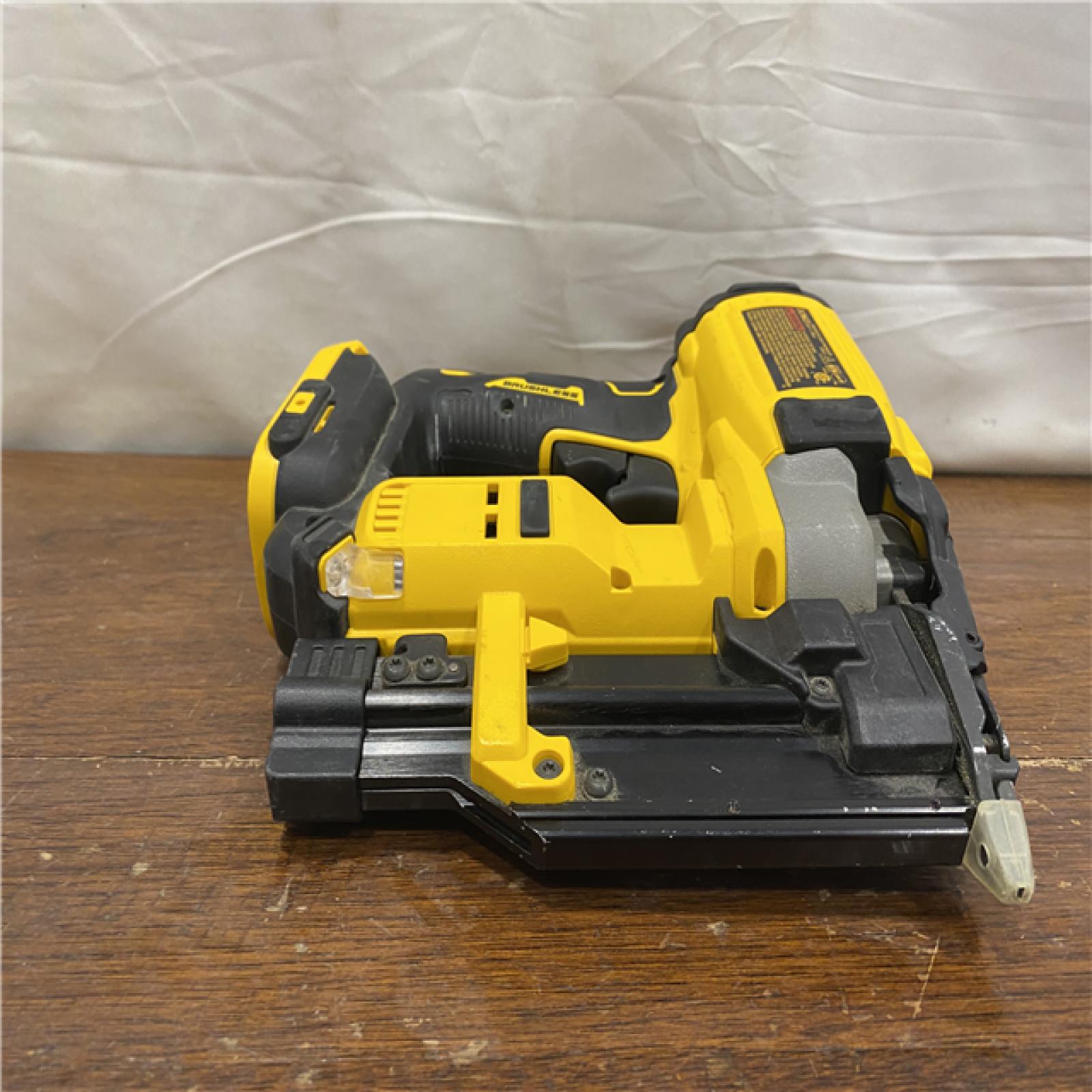 AS-IS DEWALT ATOMIC 20V MAX Lithium Ion Cordless 23 Gauge Pin Nailer Kit with 3.0Ah Battery and Charger