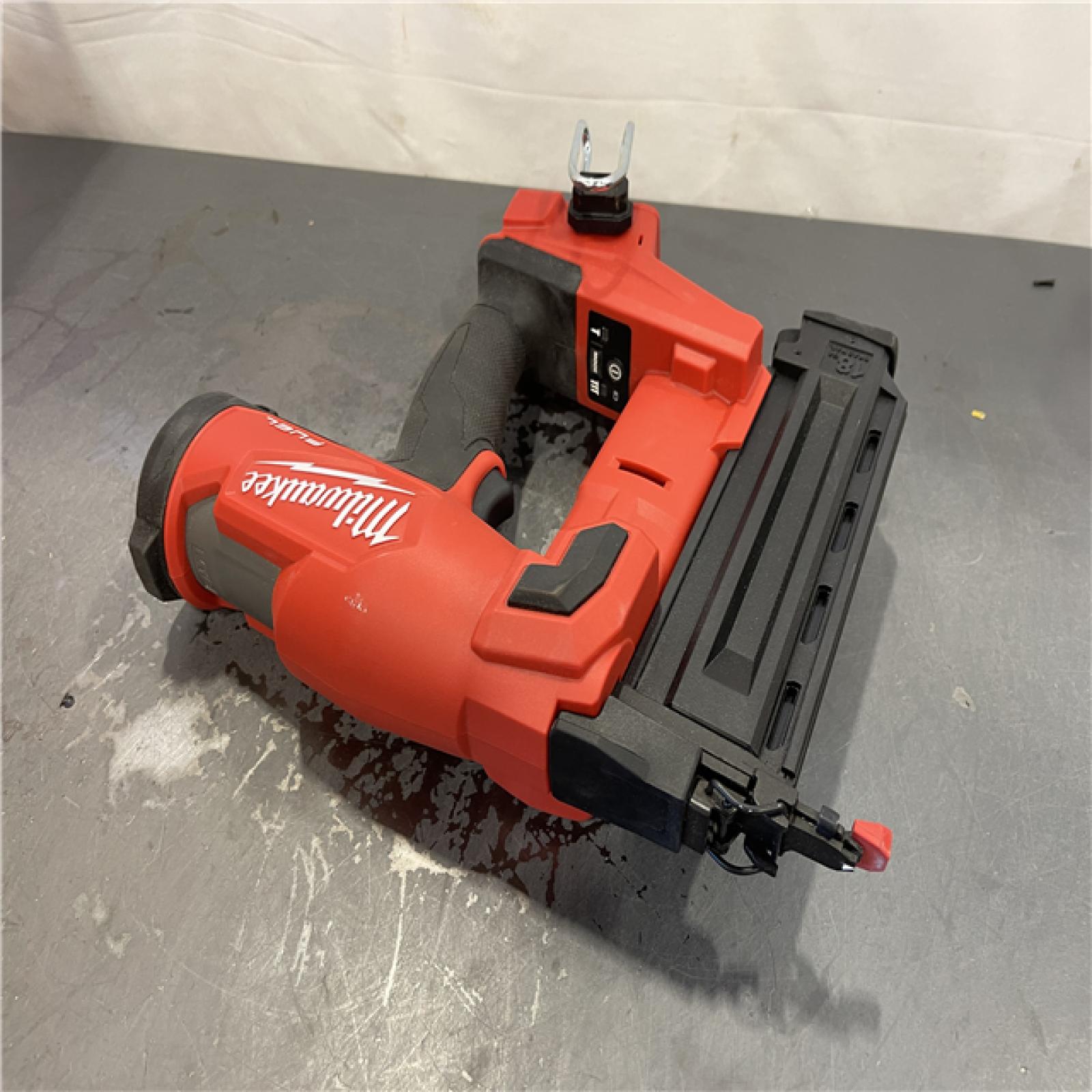 AS-IS - Milwaukee M18 FUEL 18-Volt Lithium-Ion Brushless Cordless Gen II 18-Gauge Brad Nailer