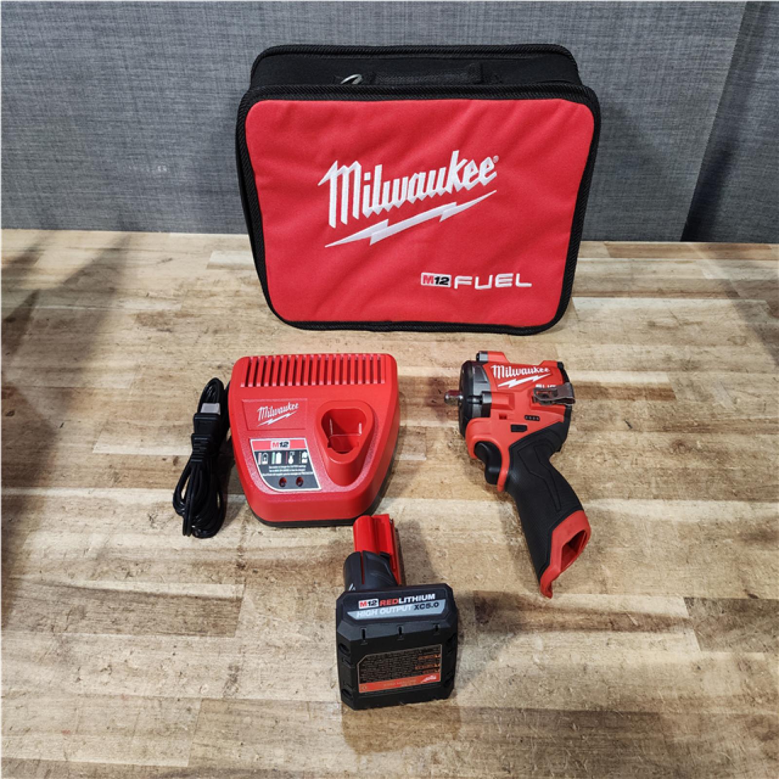 Houston Location AS-IS Milwaukee FUEL 12V Li-Ion Brushless Cordless Stubby 3/8 in. Impact Wrench Kit