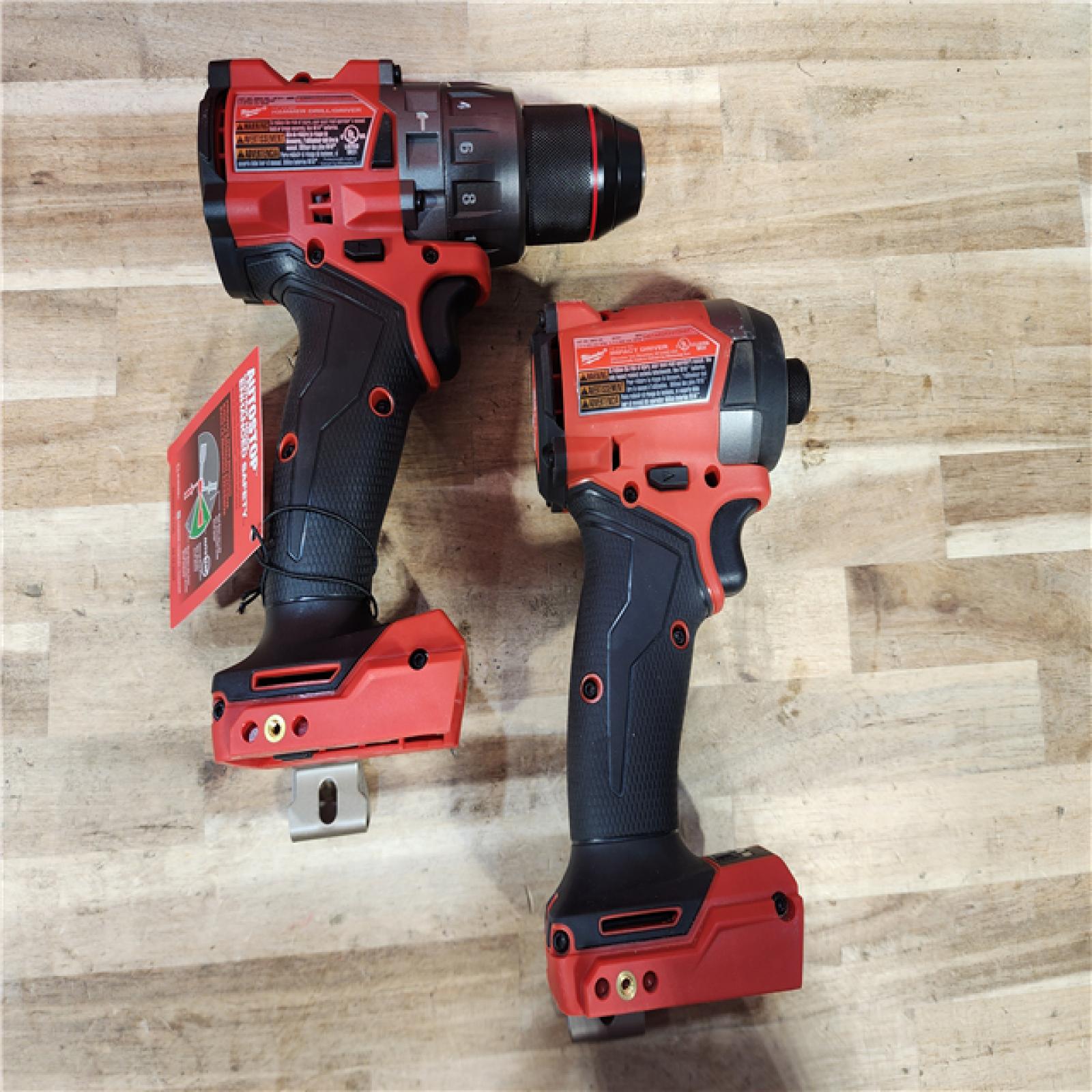 HOUSTON LOCATION - AS-IS Milwaukee FUEL 18V Lithium-Ion Brushless Cordless Hammer Drill and Impact Driver Combo Kit