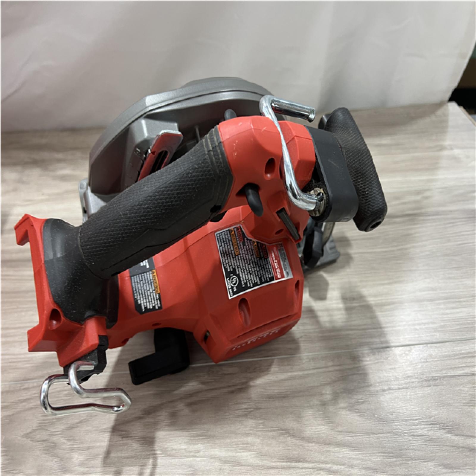 AS-IS Milwaukee FUEL 18V Lithium-Ion Brushless Cordless 6-1/2 in. Circular Saw (Tool-Only)