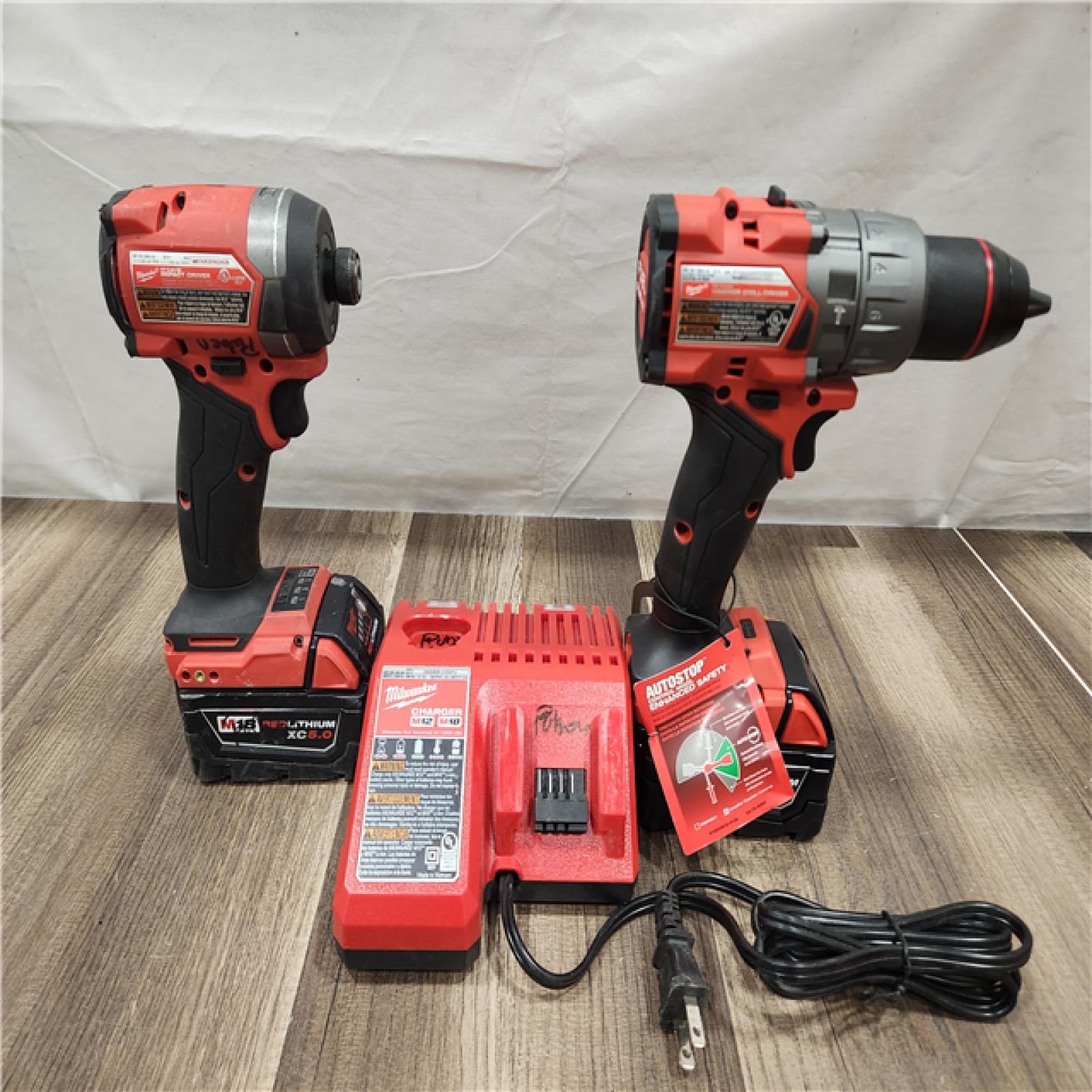 AS-IS- MILWAUKEE FUEL 18V Lithium-Ion Brushless Cordless Hammer Drill and Impact Driver Combo Kit