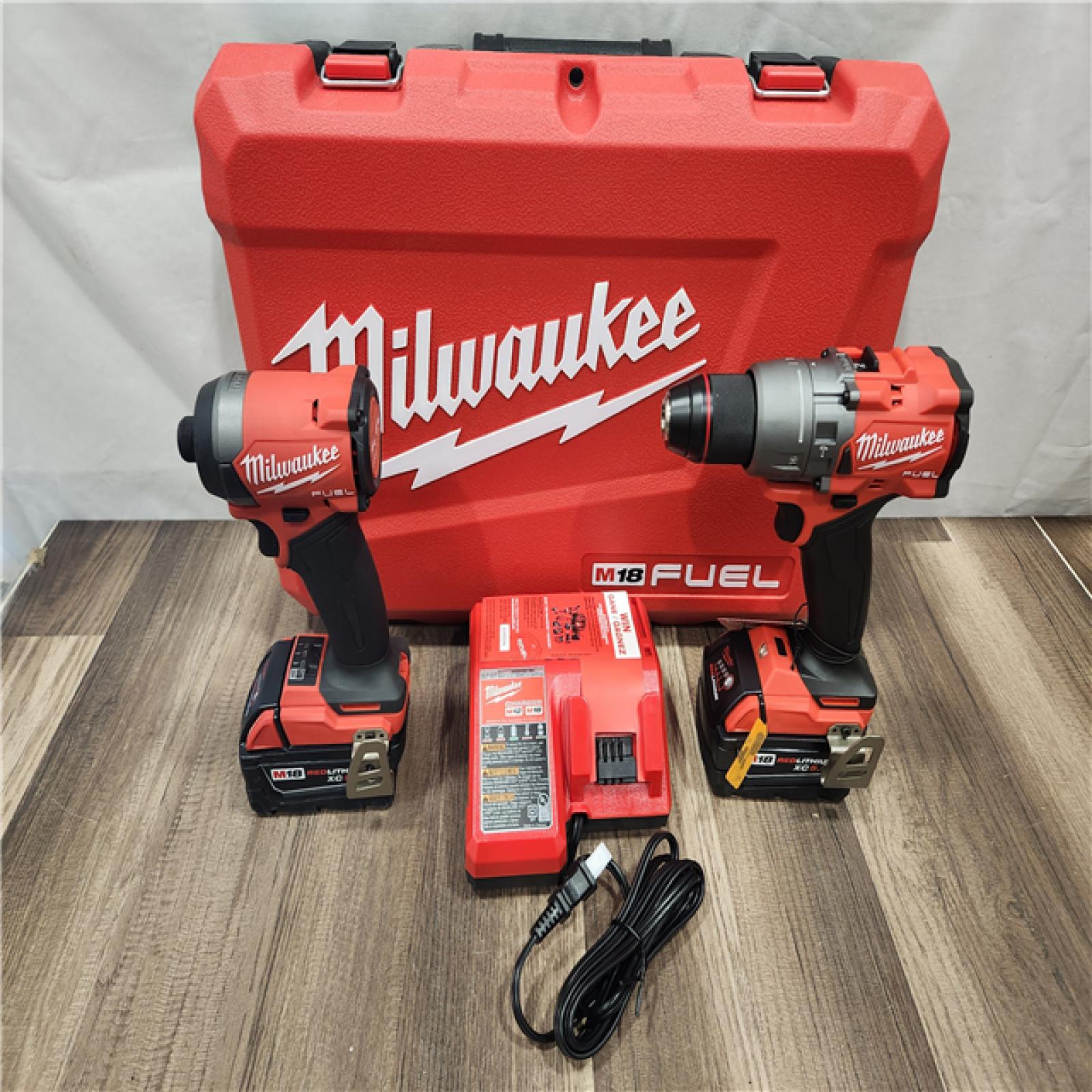 AS-IS- MILWAUKEE FUEL 18V Lithium-Ion Brushless Cordless Hammer Drill and Impact Driver Combo Kit