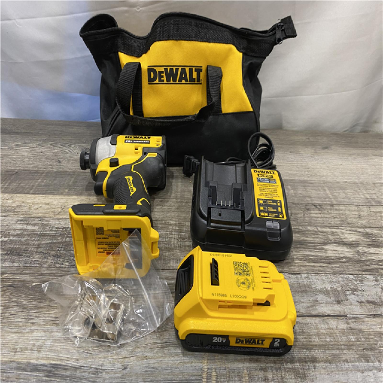 AS-IS DEWALT Atomic 20V Max Lithium-Ion Brushless Cordless Compact 1/4 in. Impact Driver Kit
