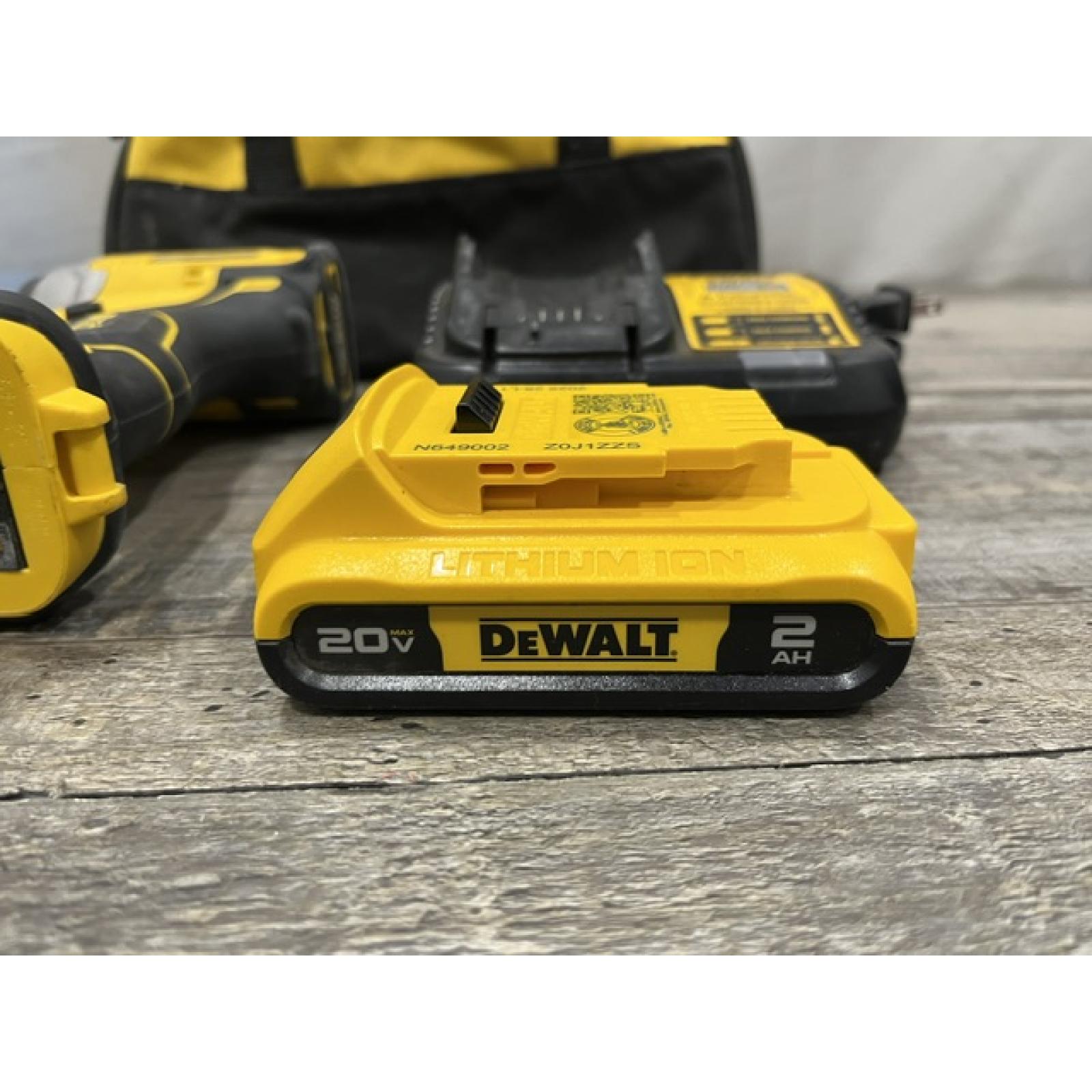AS-IS DEWALT Atomic 20V Max Lithium-Ion Brushless Cordless Compact 1/4 in. Impact Driver Kit