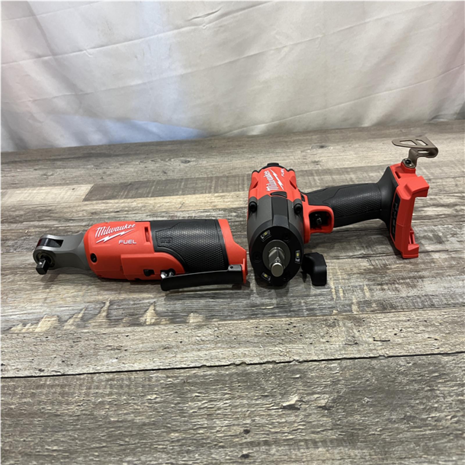 AS-IS Milwaukee FUEL 18V Cordless Mid Torque 1/2 in. Impact Wrench w/ 12 FUEL 3/8 in. Ratchet Combo Kit