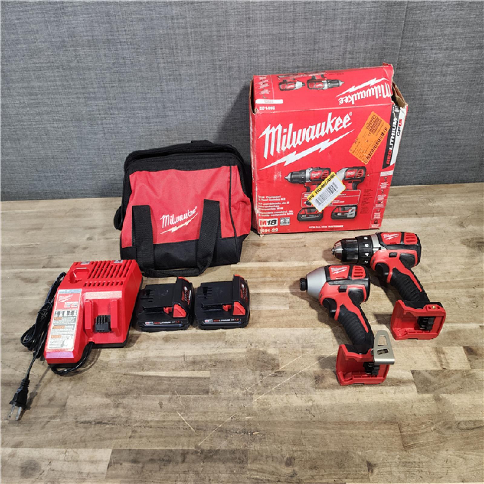 HOUSTON LOCATION - AS-IS Milwaukee 18V Cordless Brushed 2-Tool Drill/Driver and Impact Driver Kit