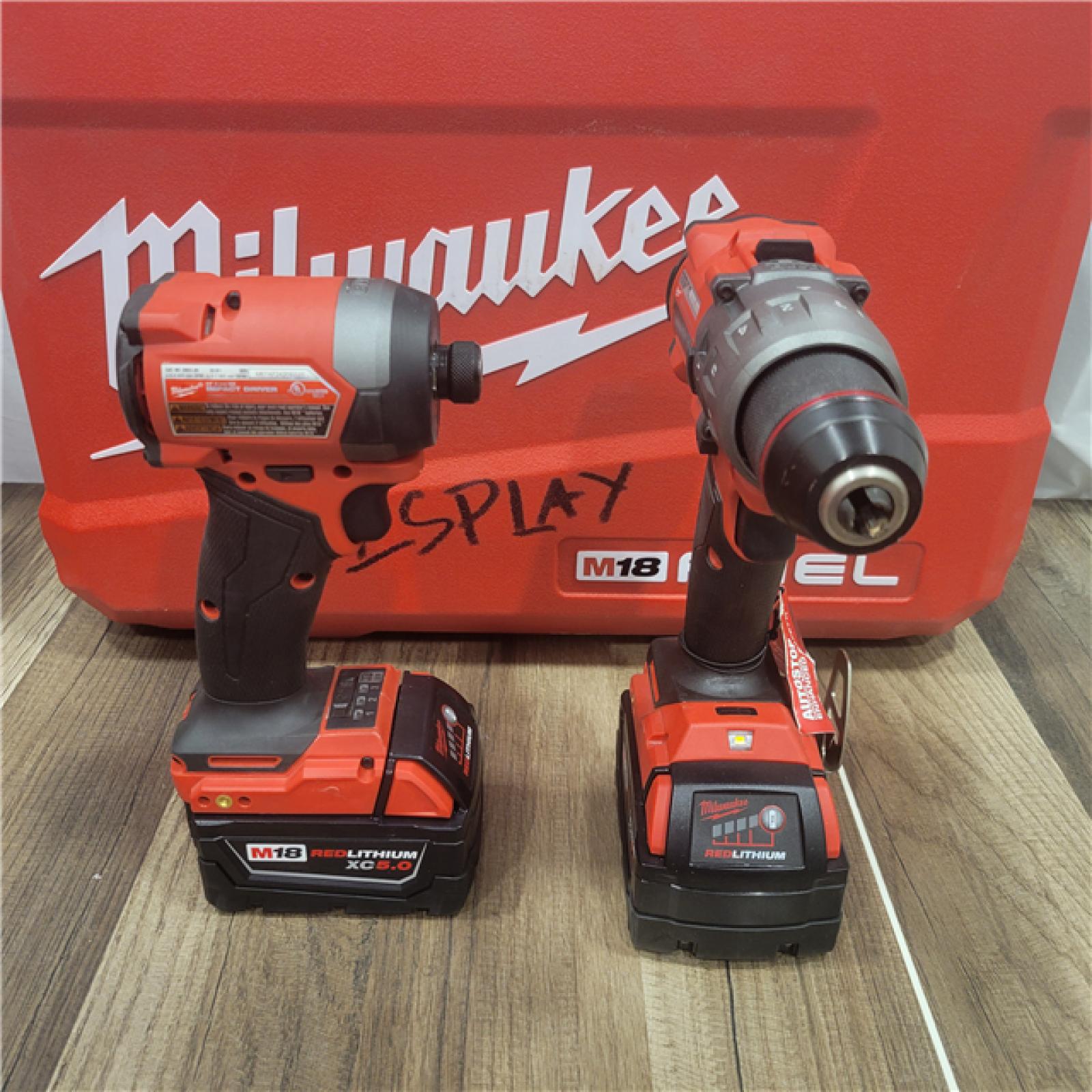 AS-IS MILWAUKEE M18 FUEL 18V Lithium-Ion Brushless Cordless Hammer Drill and Impact Driver Combo Kit (2-Tool) with 2 Batteries