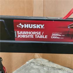 Houston Location - AS-IS Husky 25.5 in. X 42.5 W/25.5 in. to 32.5 in. H Adjustable Saw Horse and Jobsite Table with 1300 Lbs. Capacity - Appears IN NEW Condition