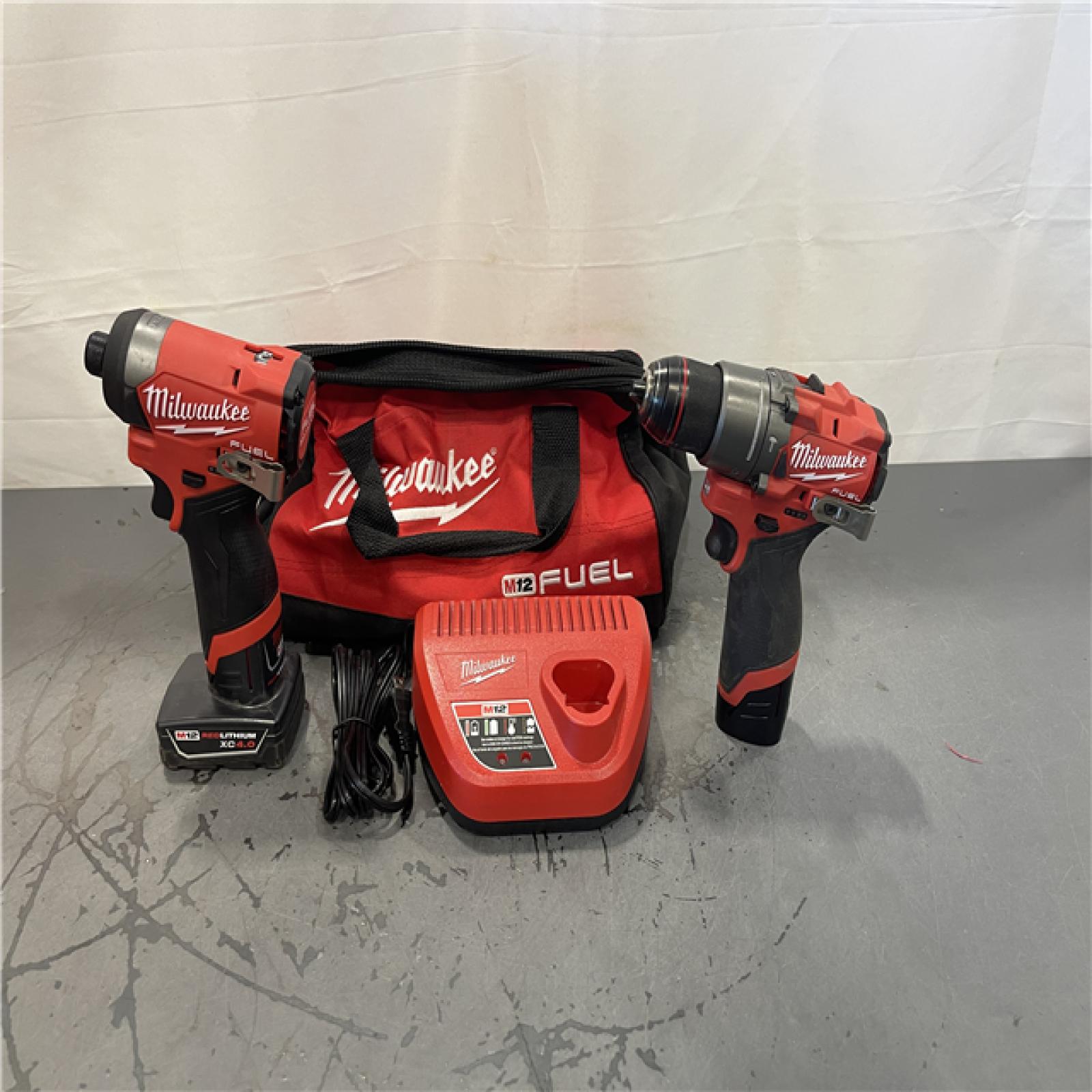 AS-IS- Milwaukee 12V Brushless Hammer Drill and Impact Driver Combo Kit